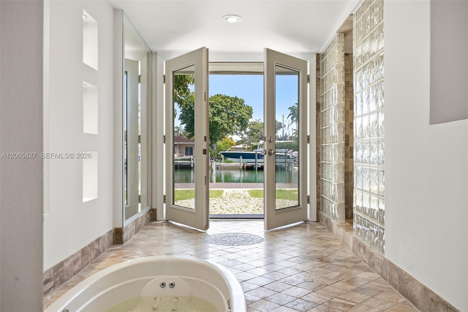 Primary Bathroom_Sunken Tub with view to the Waterway