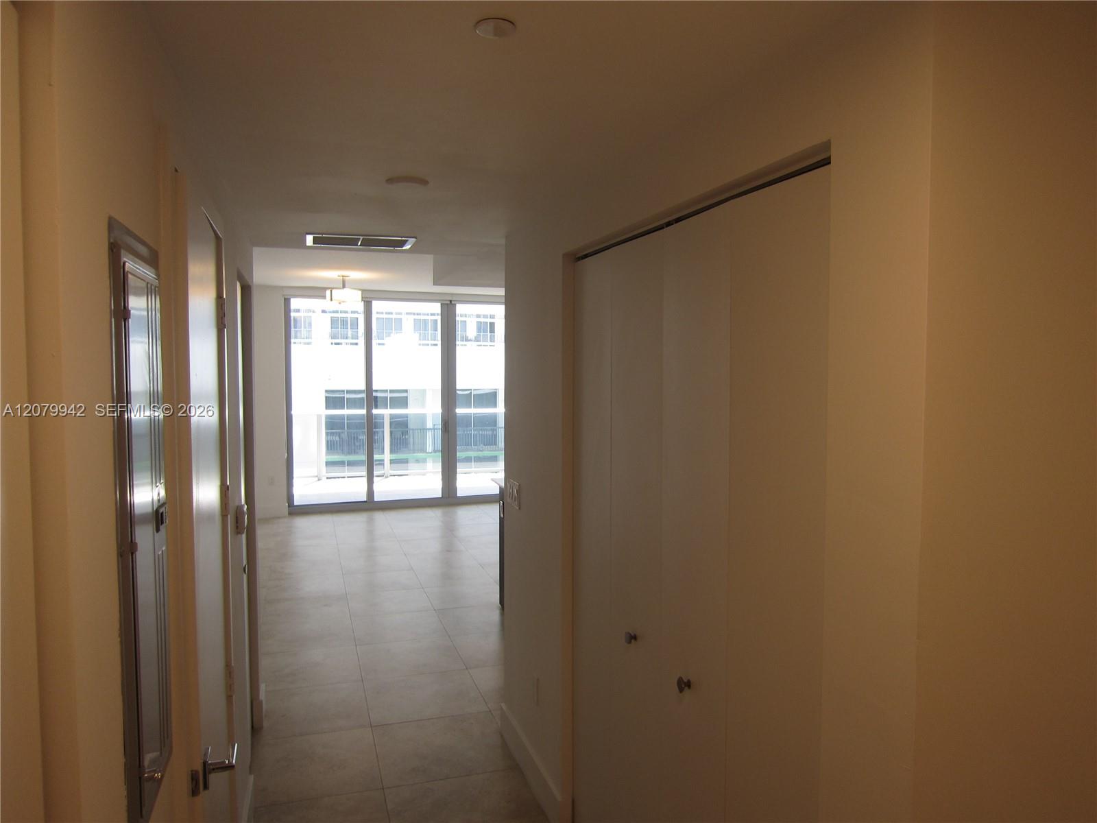 Entrance hallway:washer & Dryer and extra storage closet