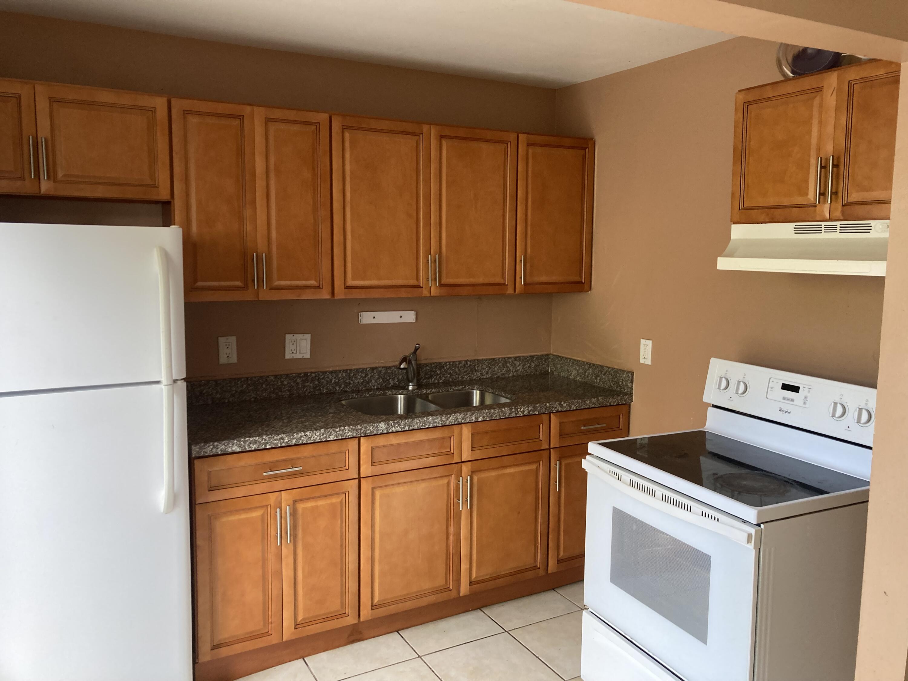 4715 NW 9TH Drive # 4715 — Photo 3
