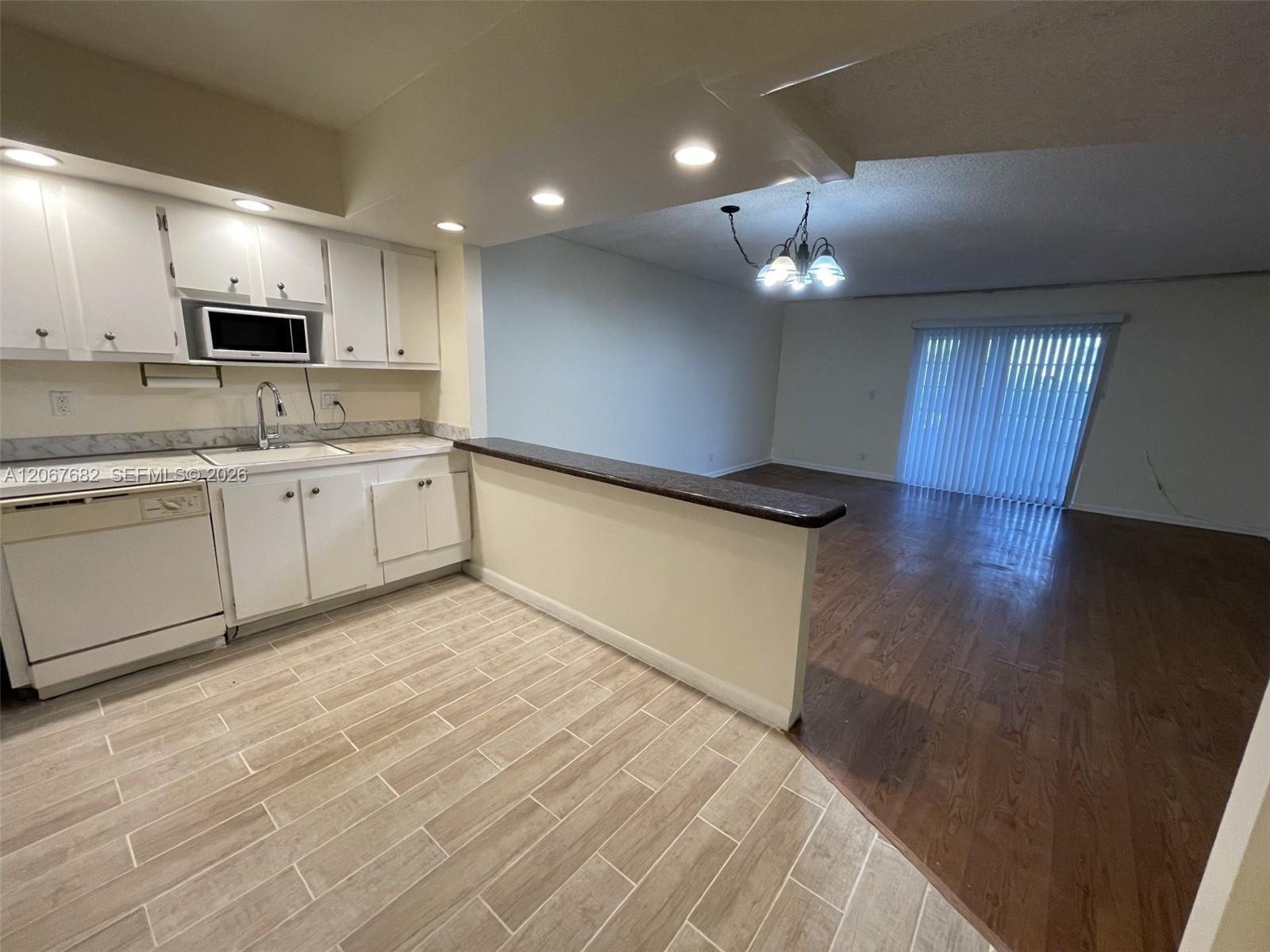 2061 NW 47th Ter # 306 — Photo 3