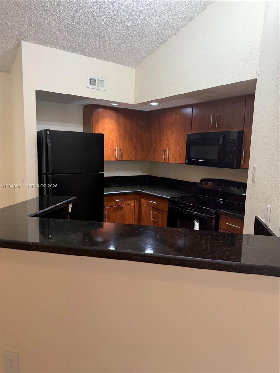 12950 VISTA ISLES DRIVE # 424, Sunrise FL 33325