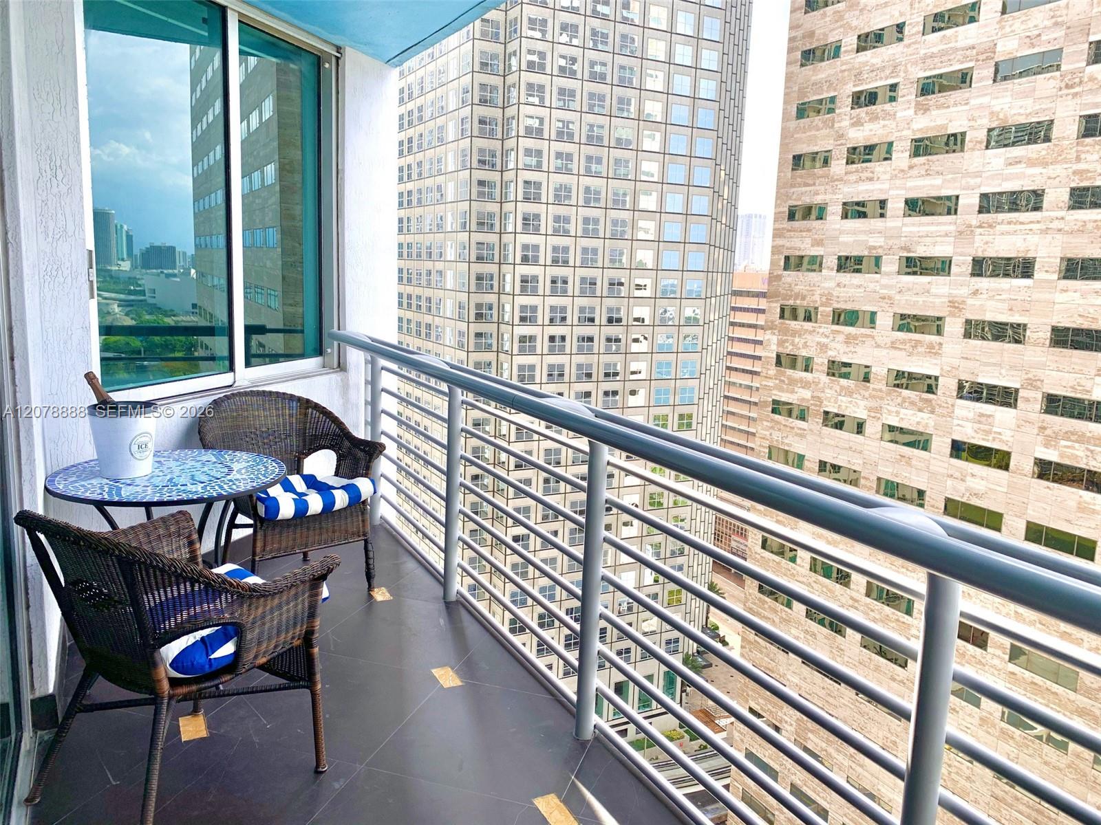 Balcony side view facing west. Balcony front view is Biscayne Bay and Bayfront Park.
