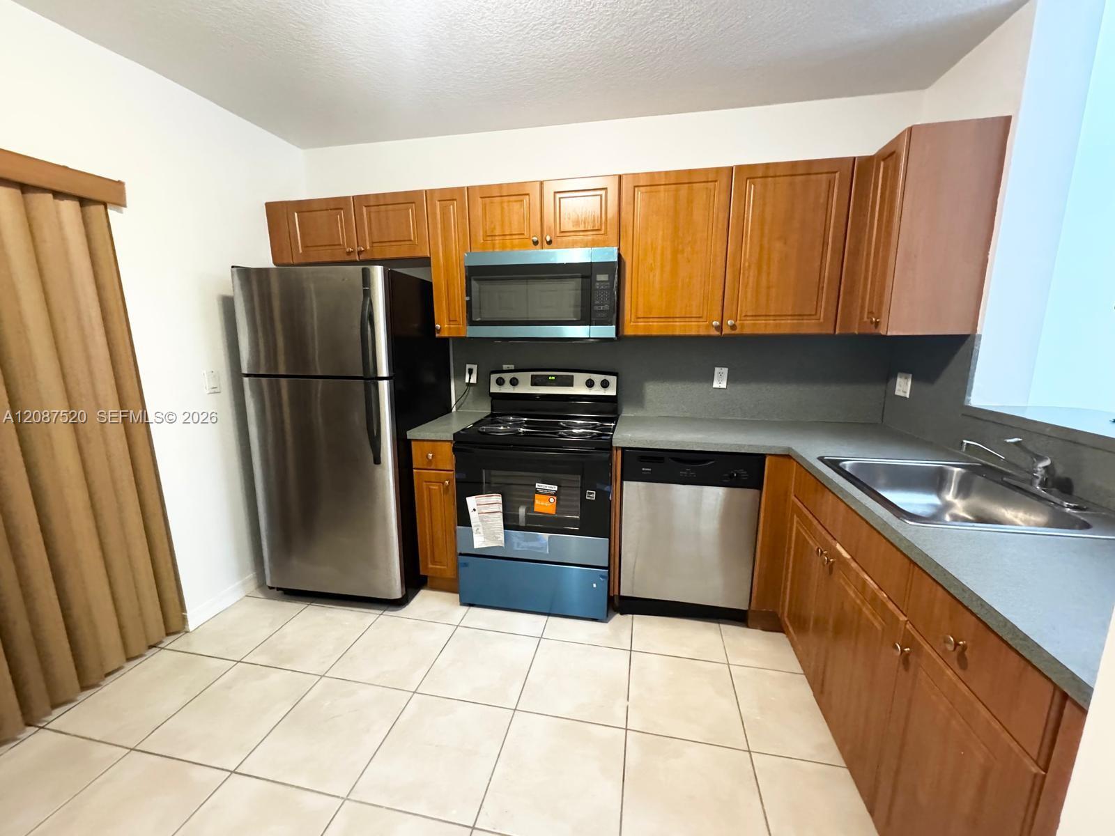 6676 SW 115th Ct # 410 — Photo 4