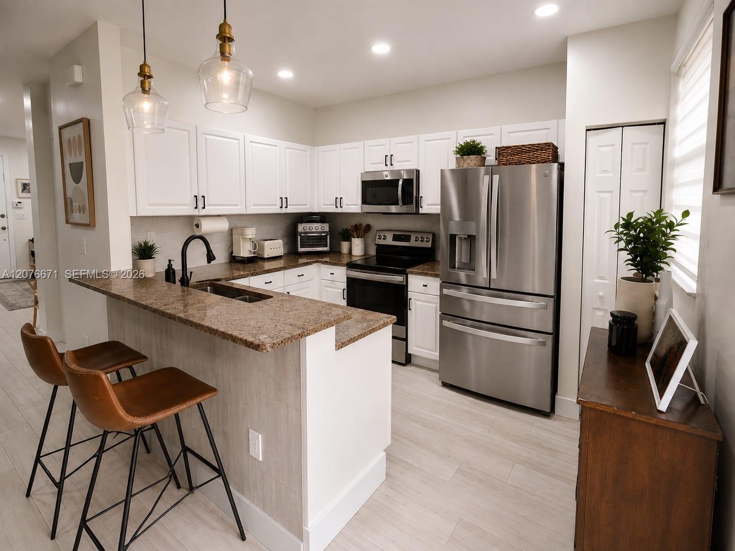 Updated walls and ceilings with smooth finish and recess lighting