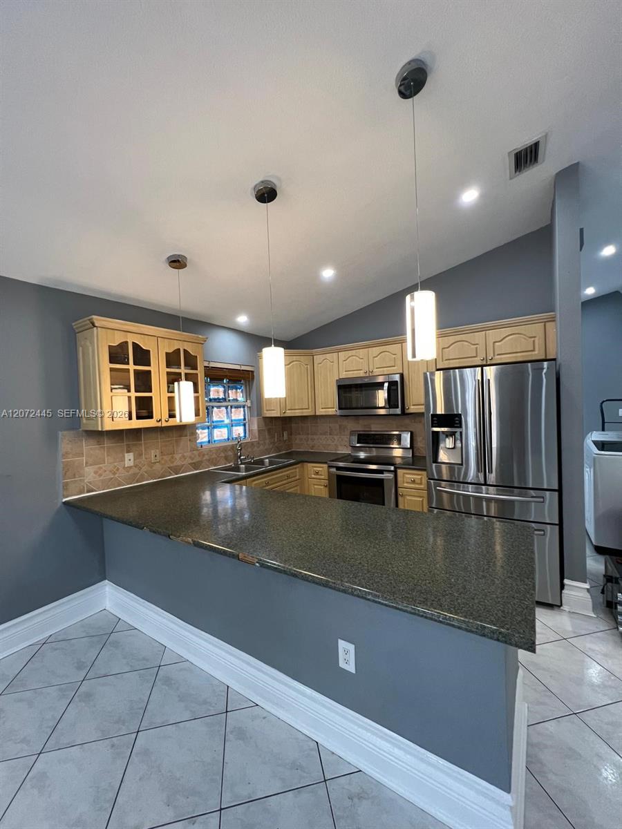 6978 W 25th Ave — Photo 5