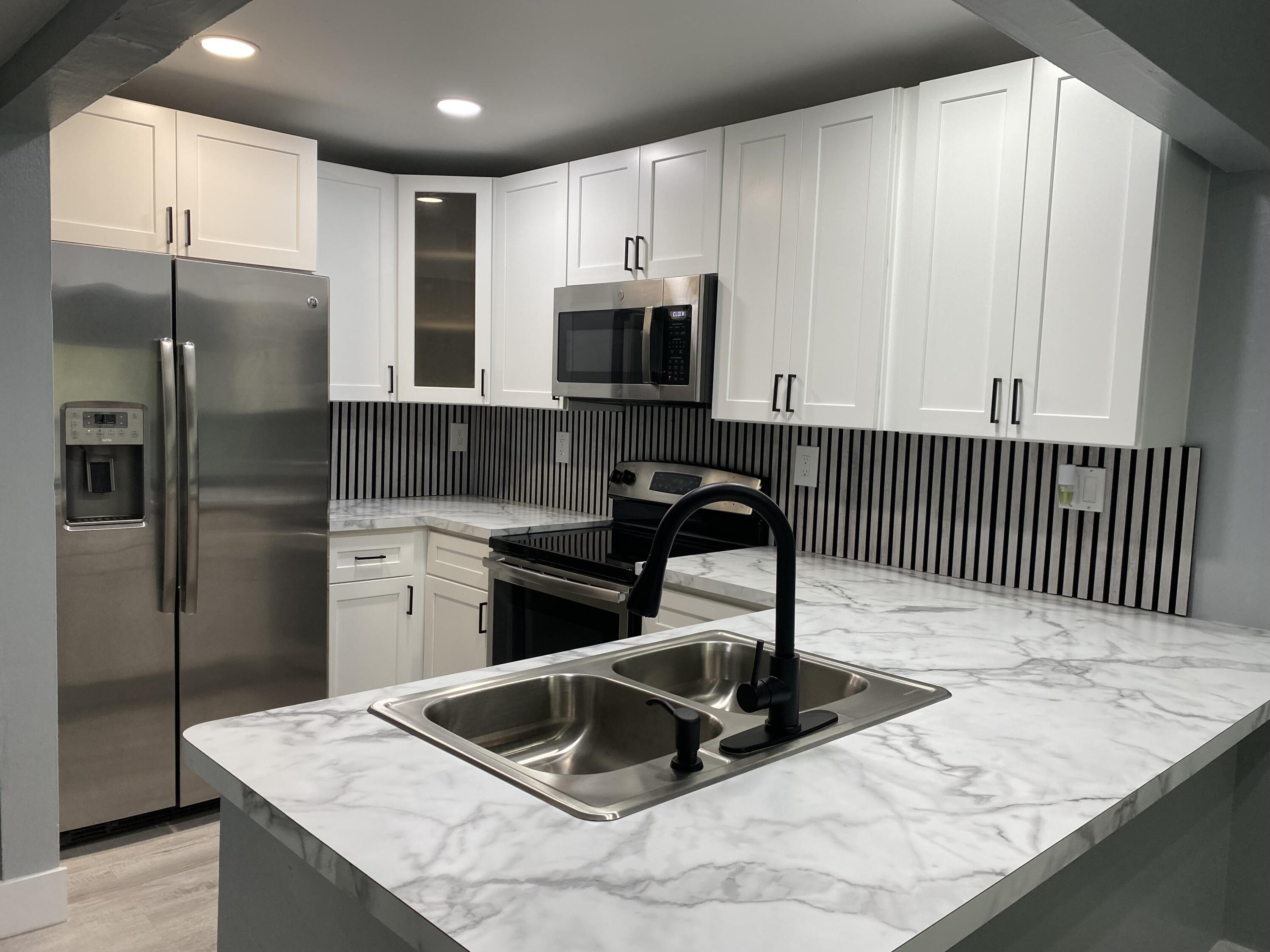 207 NW 32nd Court # 106 — Photo 3