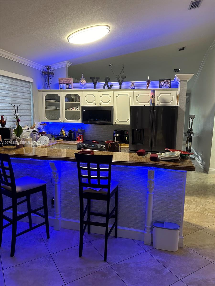 9180 NW 149th Ter — Photo 5