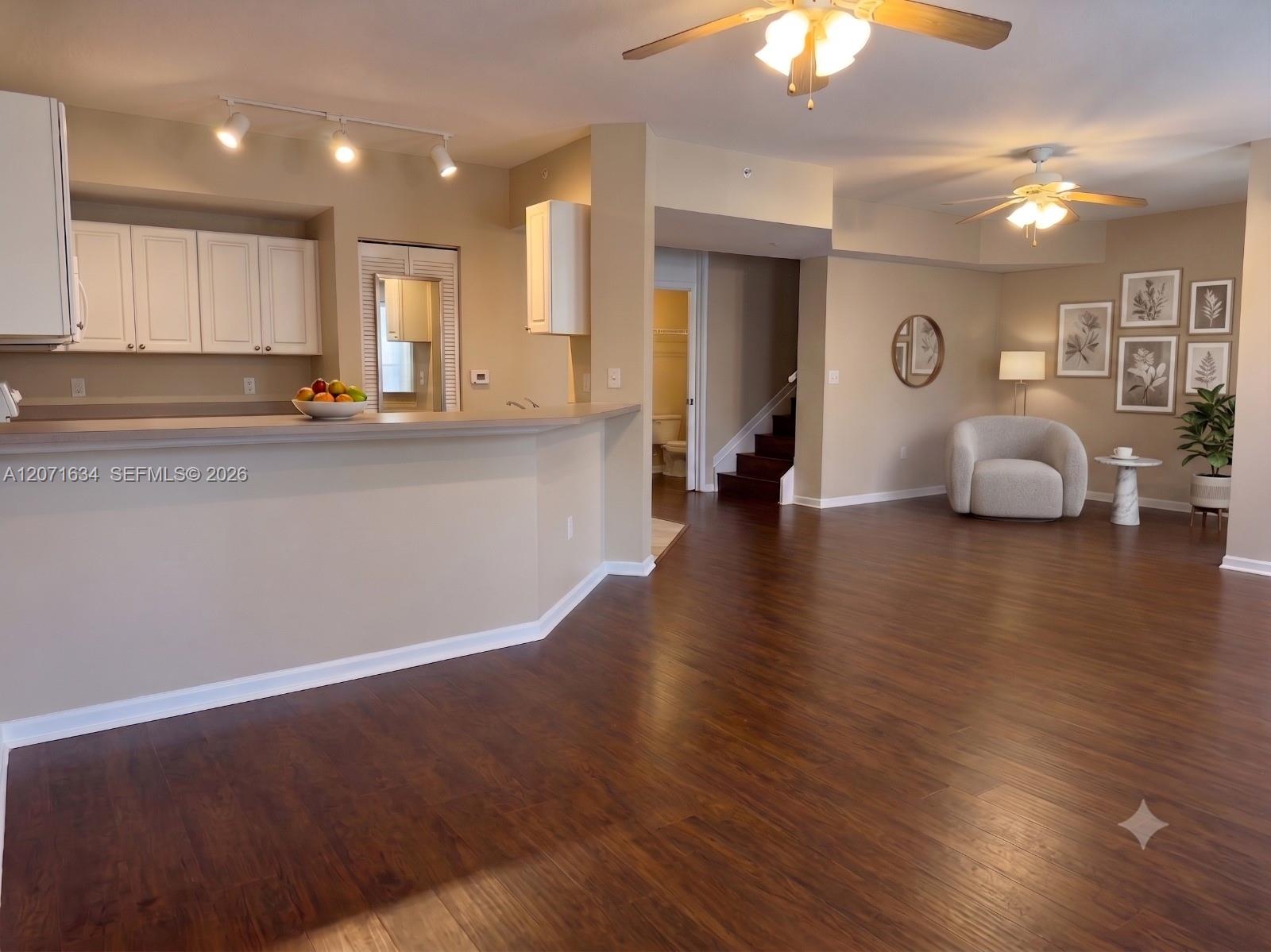 Overlooking kitchen and den