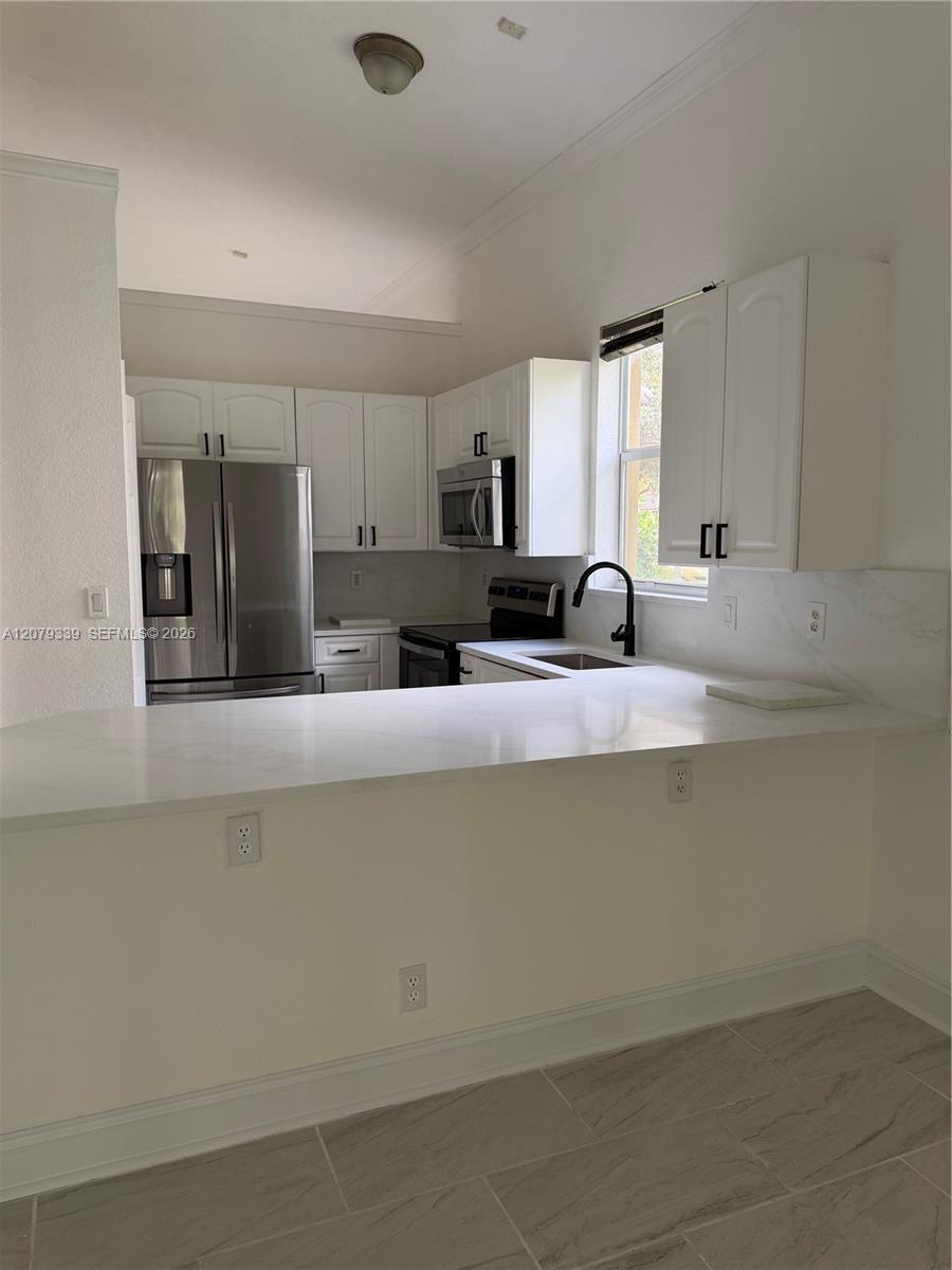 5040 SW 139th Ter — Photo 3
