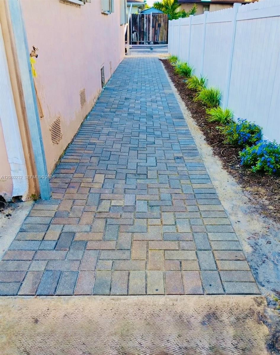 Entrance to unit is on the side of the main house
