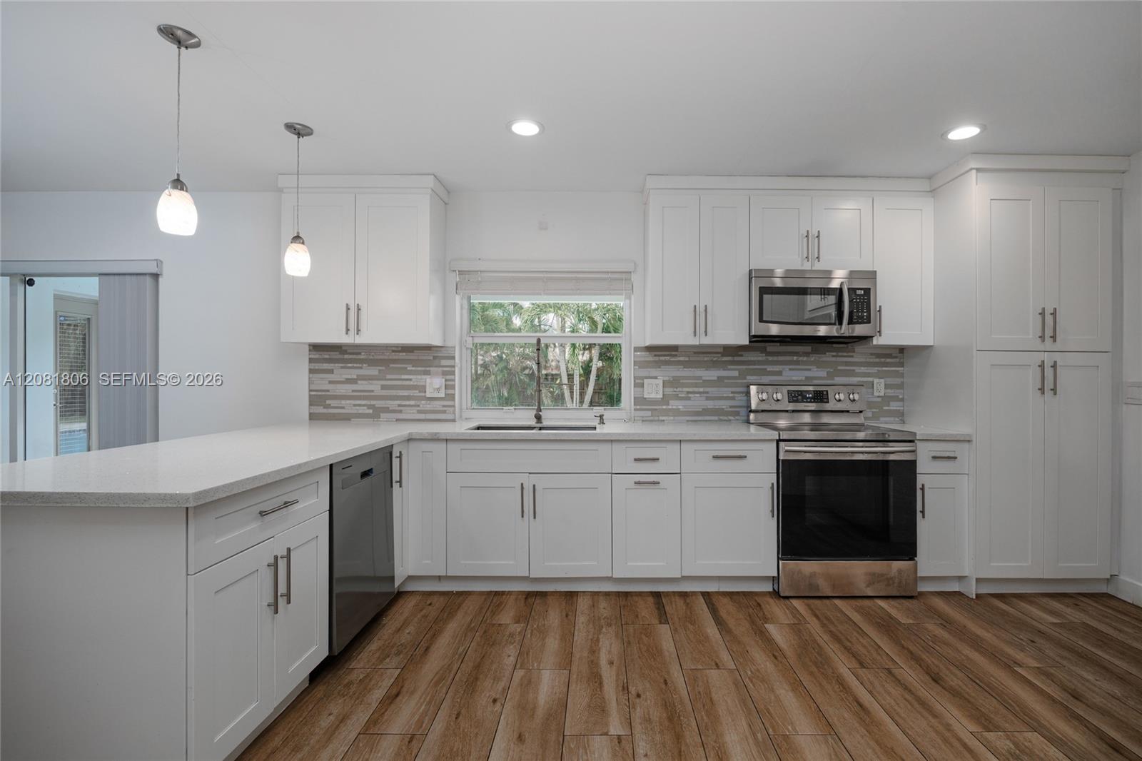 7460 NW 7th Ct — Photo 3