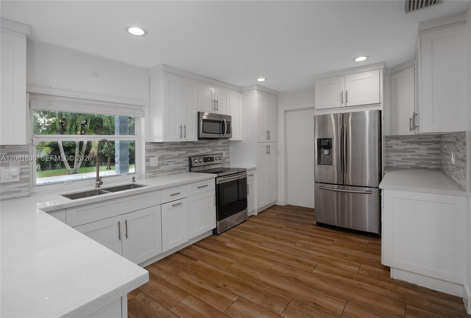 7460 NW 7th Ct — Photo 4