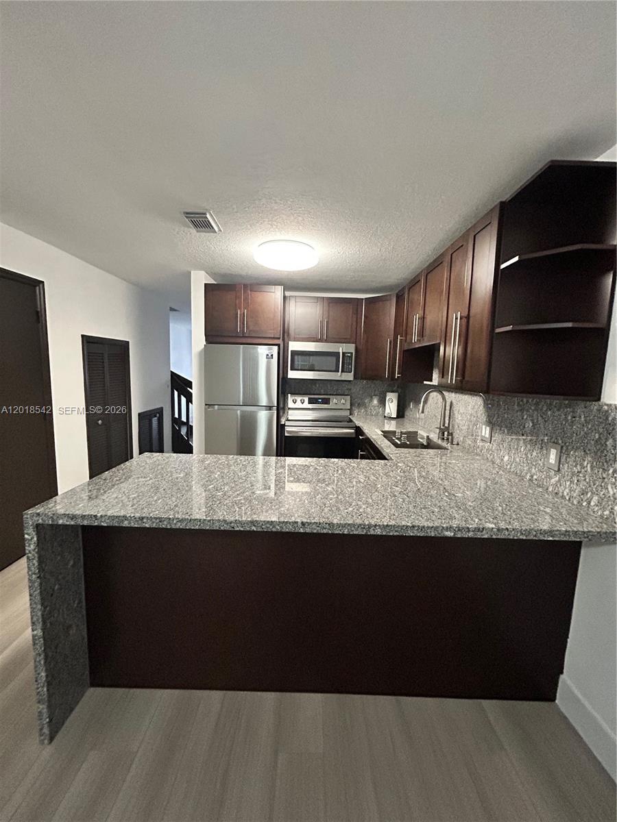 13884 SW 64th St — Photo 3
