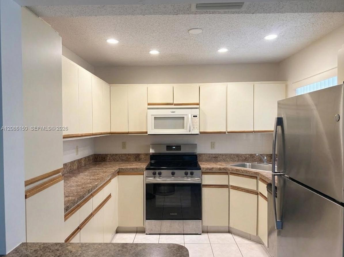 3679 Cocoplum Cir # 3528 — Photo 5
