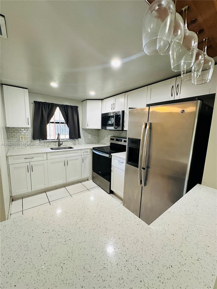6565 W 26th Dr # 104 — Photo 2