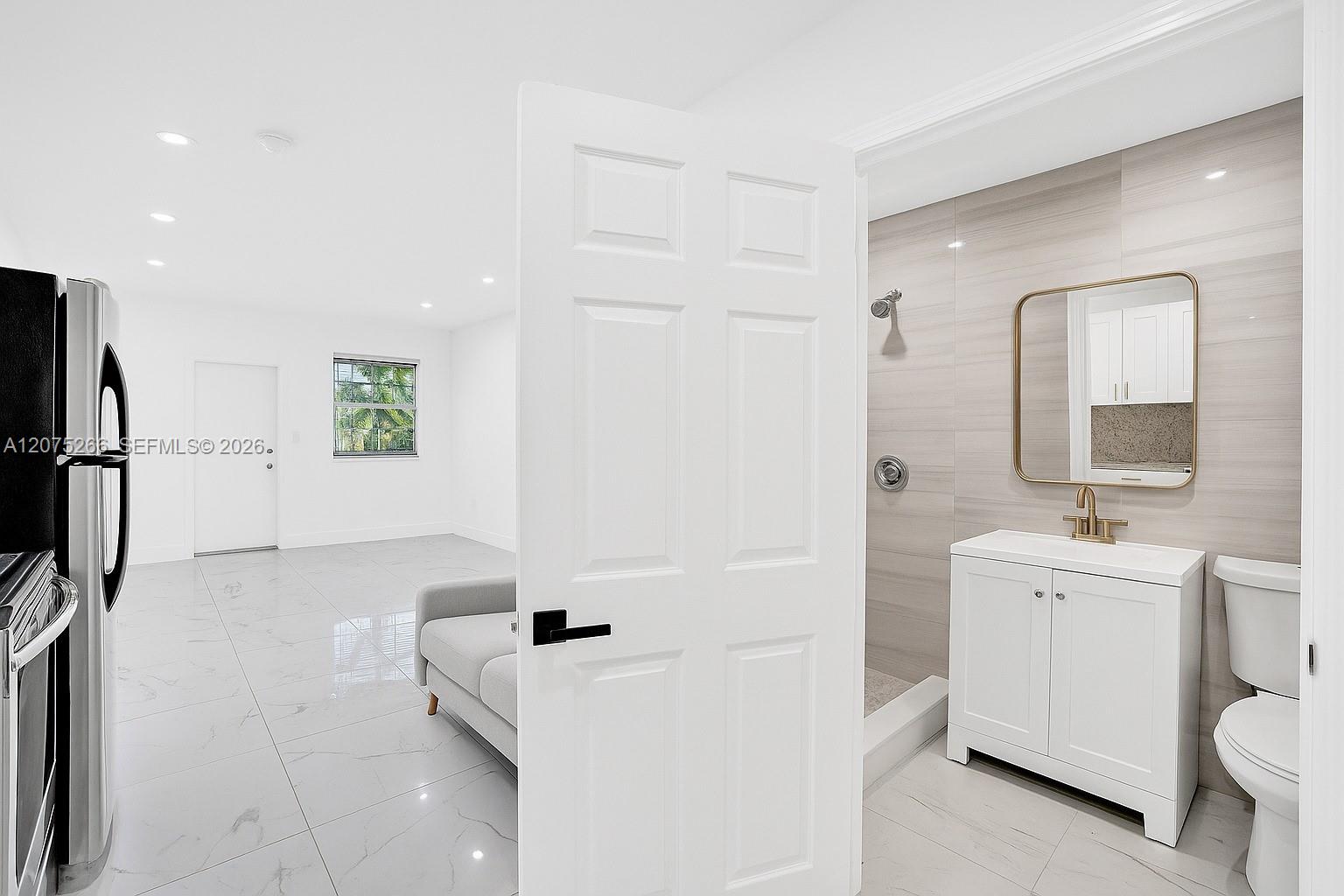 The unit is UNFURNISHED- This photo is VIRTUAL STAGED FOR VISUALIZATION