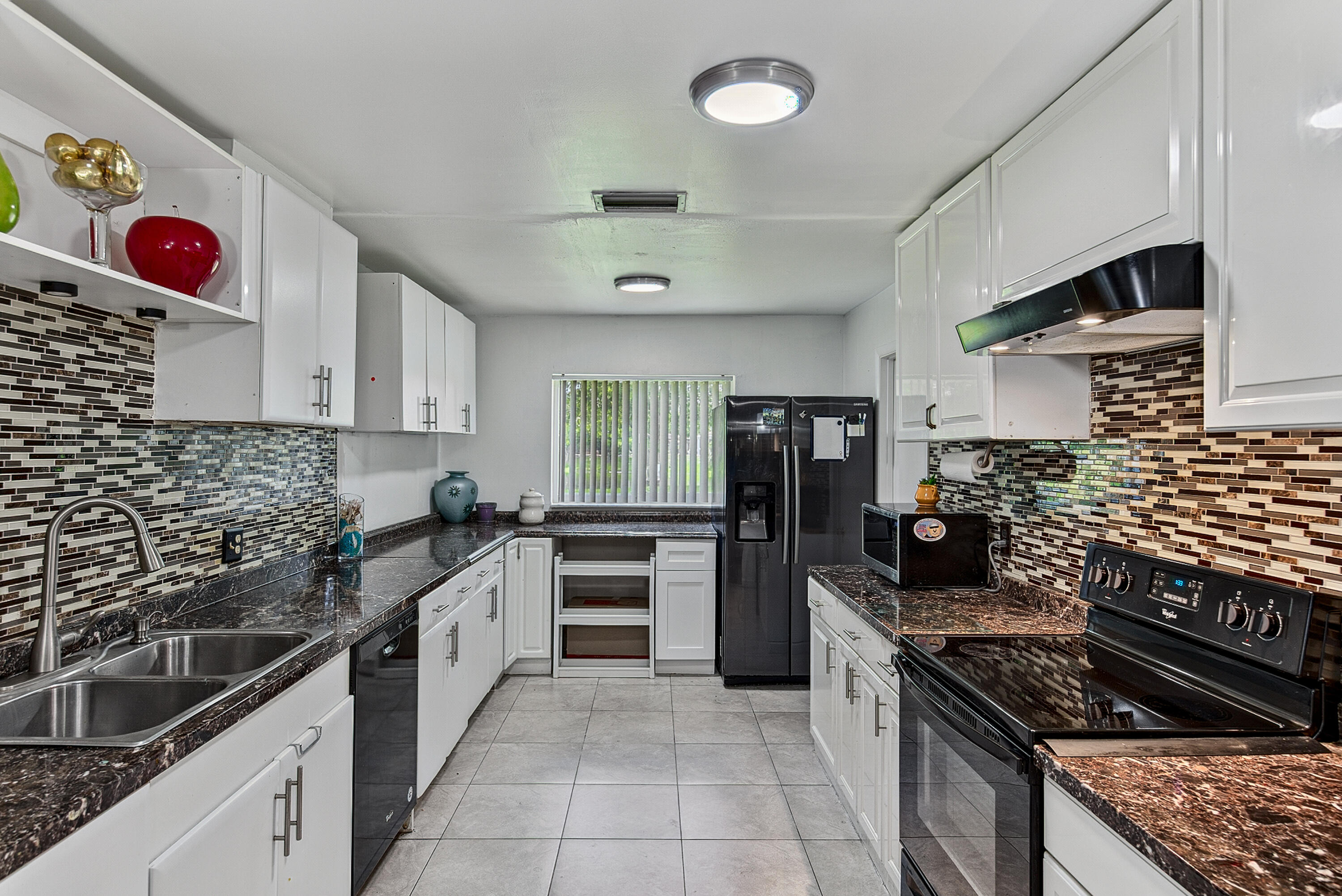 7190 NW 10TH Court — Photo 3
