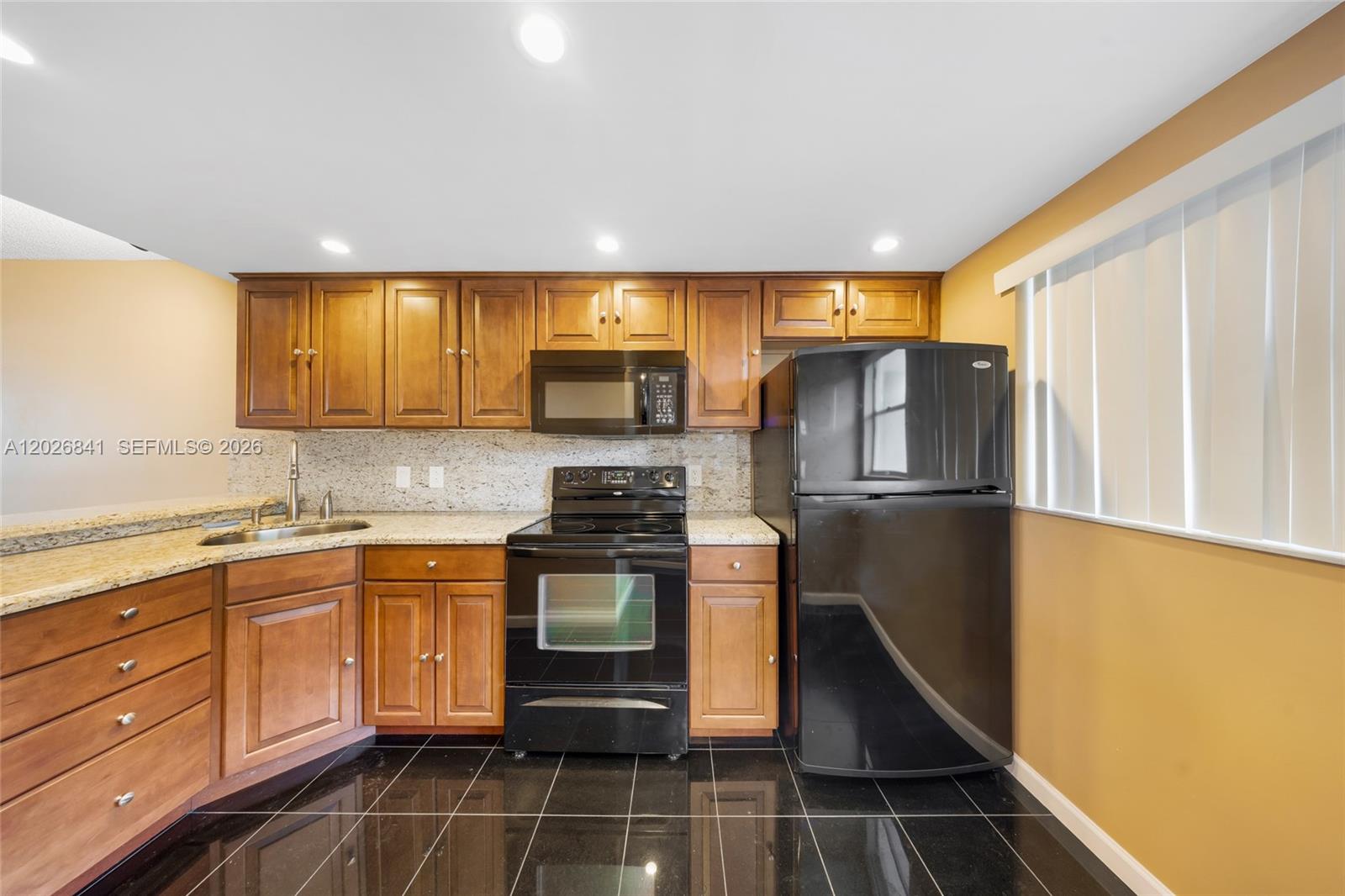6075 N Sabal Palm Blvd # 210, Tamarac FL 33319