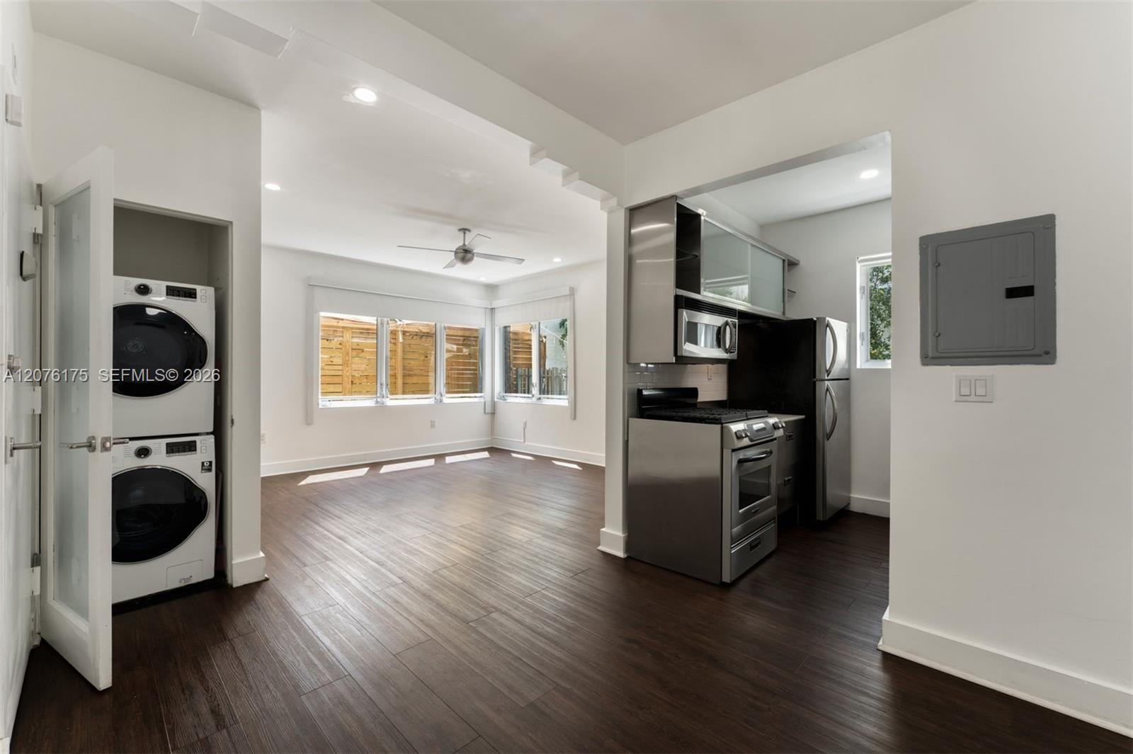 Kitchen, Living Room, and Stacked Washer/Dryer