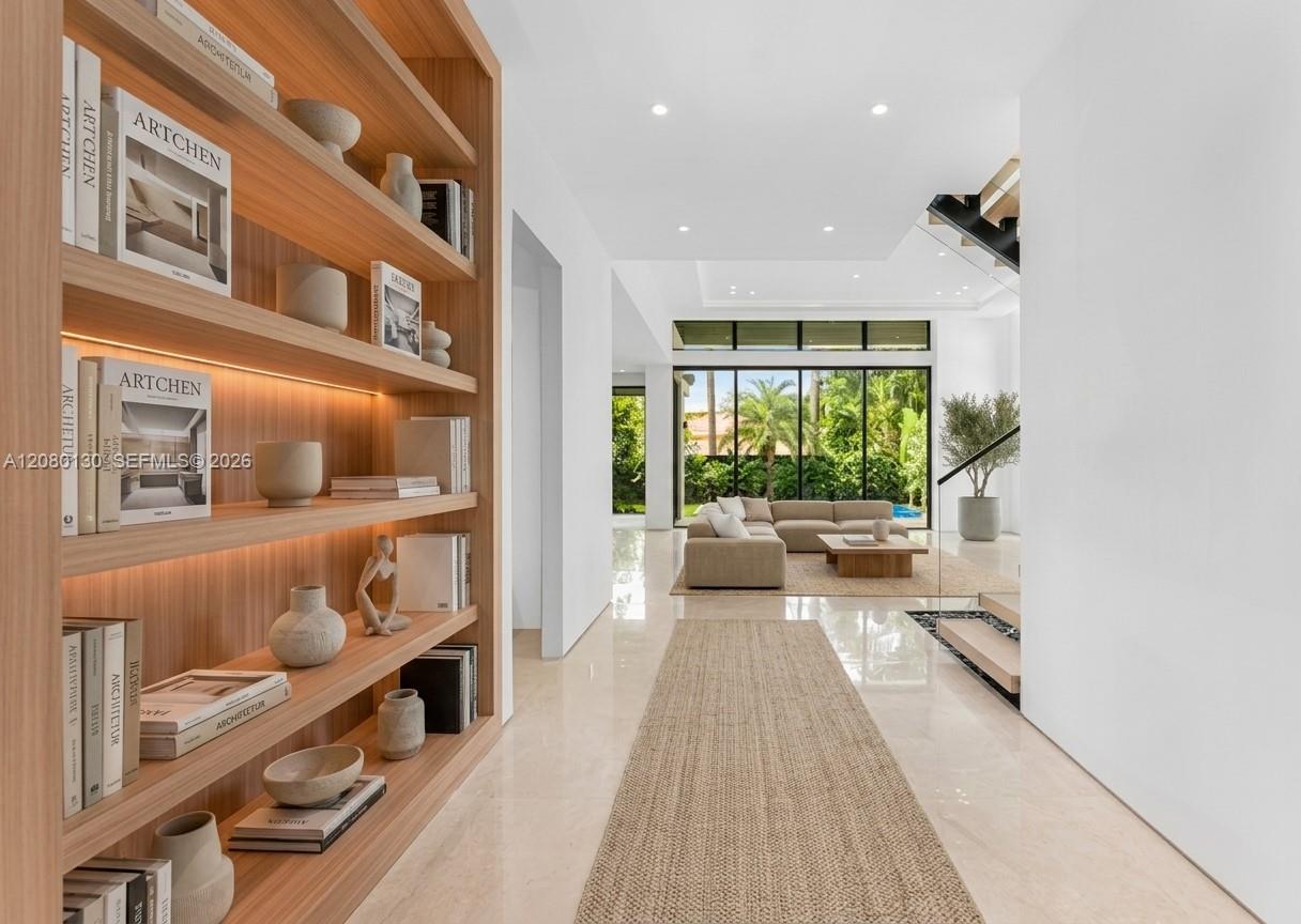 Entry. Disclaimer: Several photographs presented in this listing contain digitally added furniture, artwork, and decor. These virtually staged images are intended solely for illustrative purposes.
