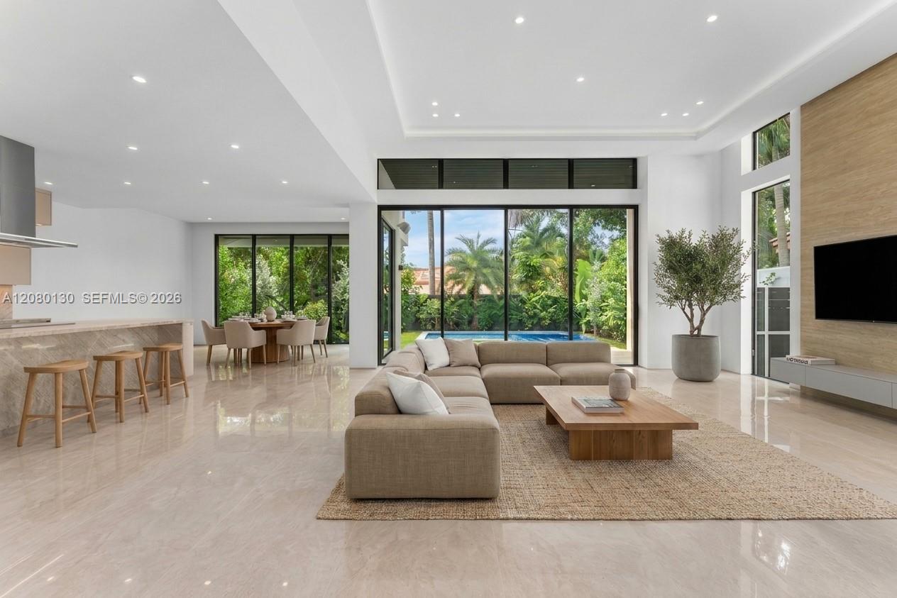 Living Room. Disclaimer: Several photographs presented in this listing contain digitally added furniture, artwork, and decor. These virtually staged images are intended solely for illustrative purposes.