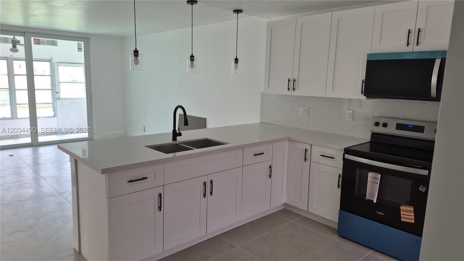 6050 NW 64th Ave # 105, Tamarac FL 33319