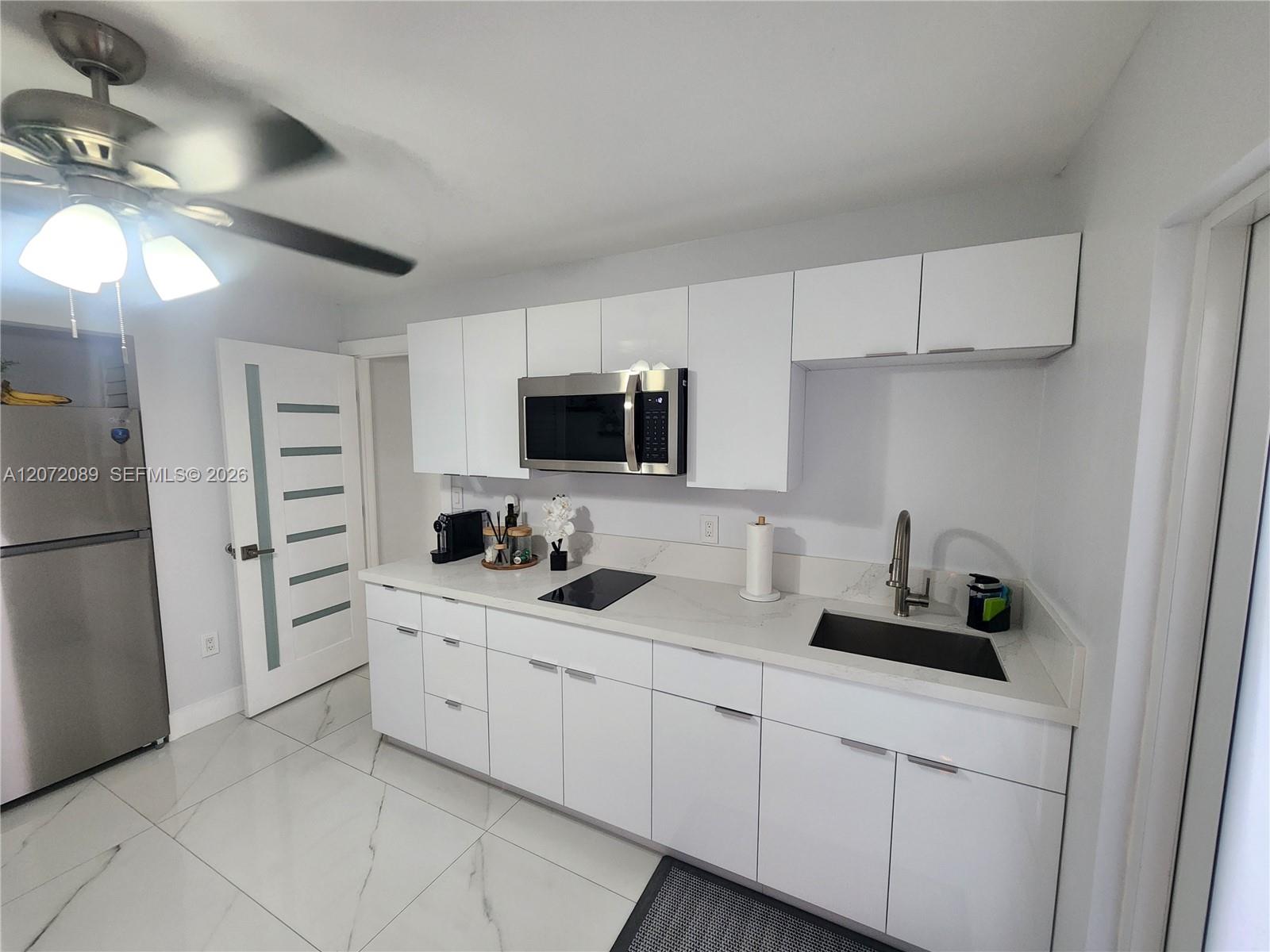 Modern kitchen with beautiful cabinets, completely remodeled to a high standard