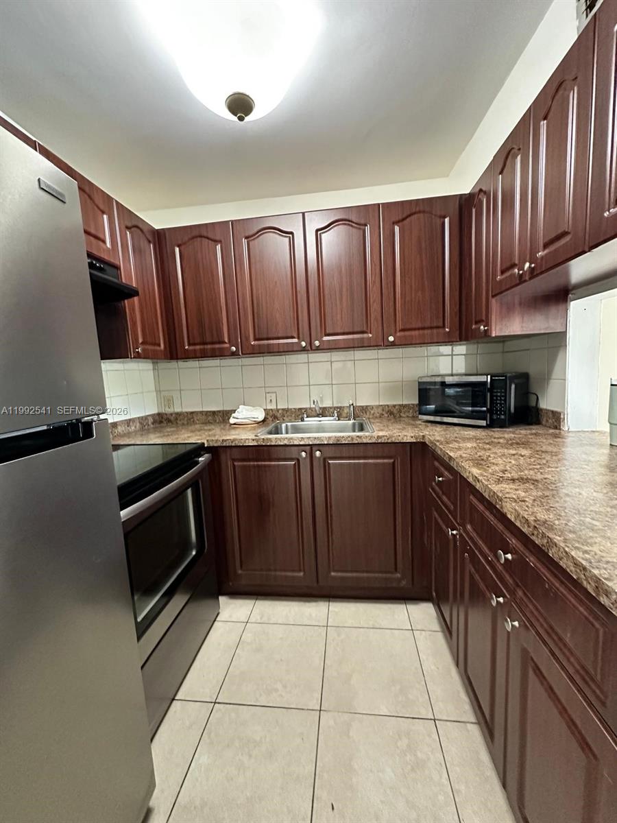 4848 NW 24th Ct # 309, Lauderdale Lakes FL 33313