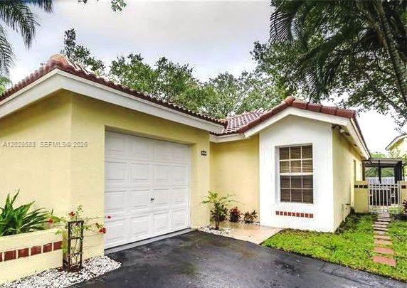 1341 Seagrape Cir, Weston FL 33326