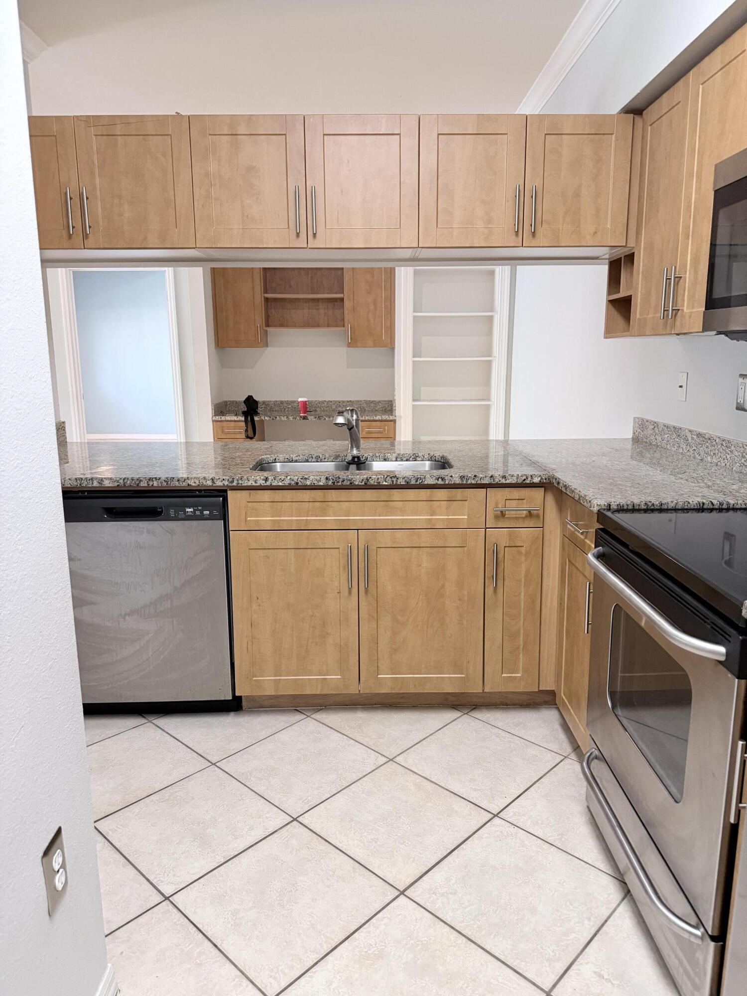 6426 EMERALD DUNES Drive # 205 — Photo 3