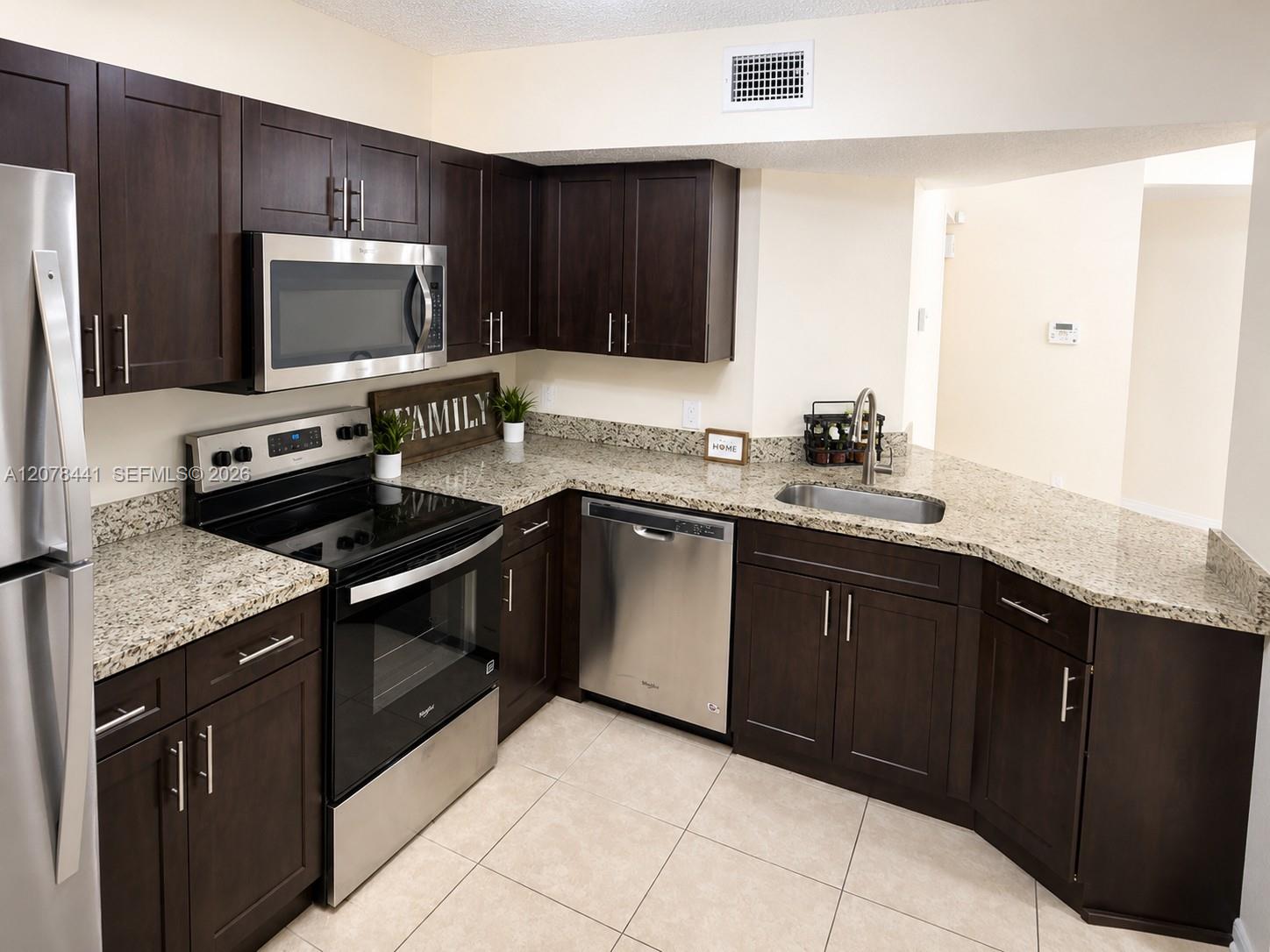 8821 Wiles Rd # 304 — Photo 4