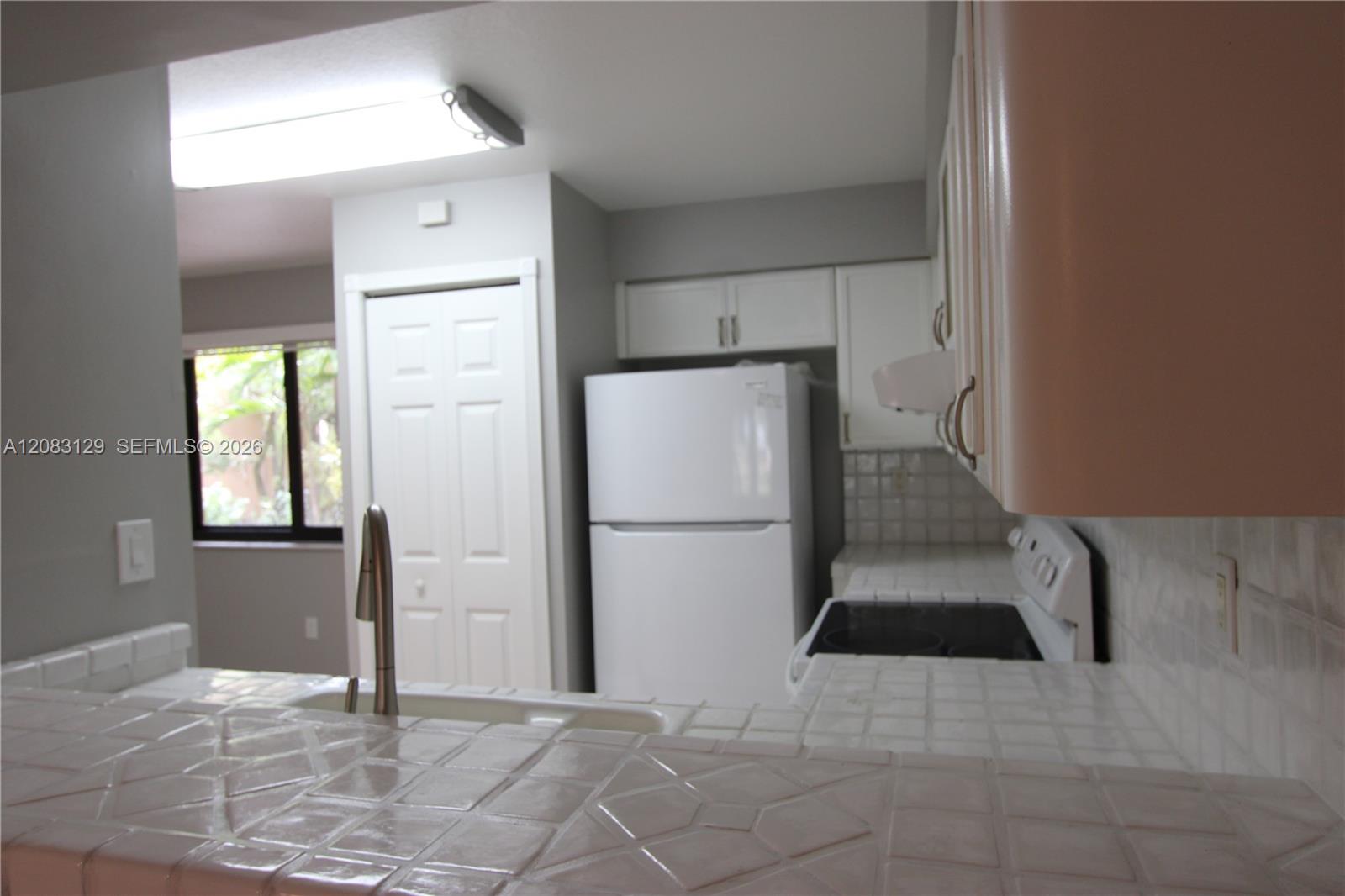 Kitchen pass thru -counter for stools