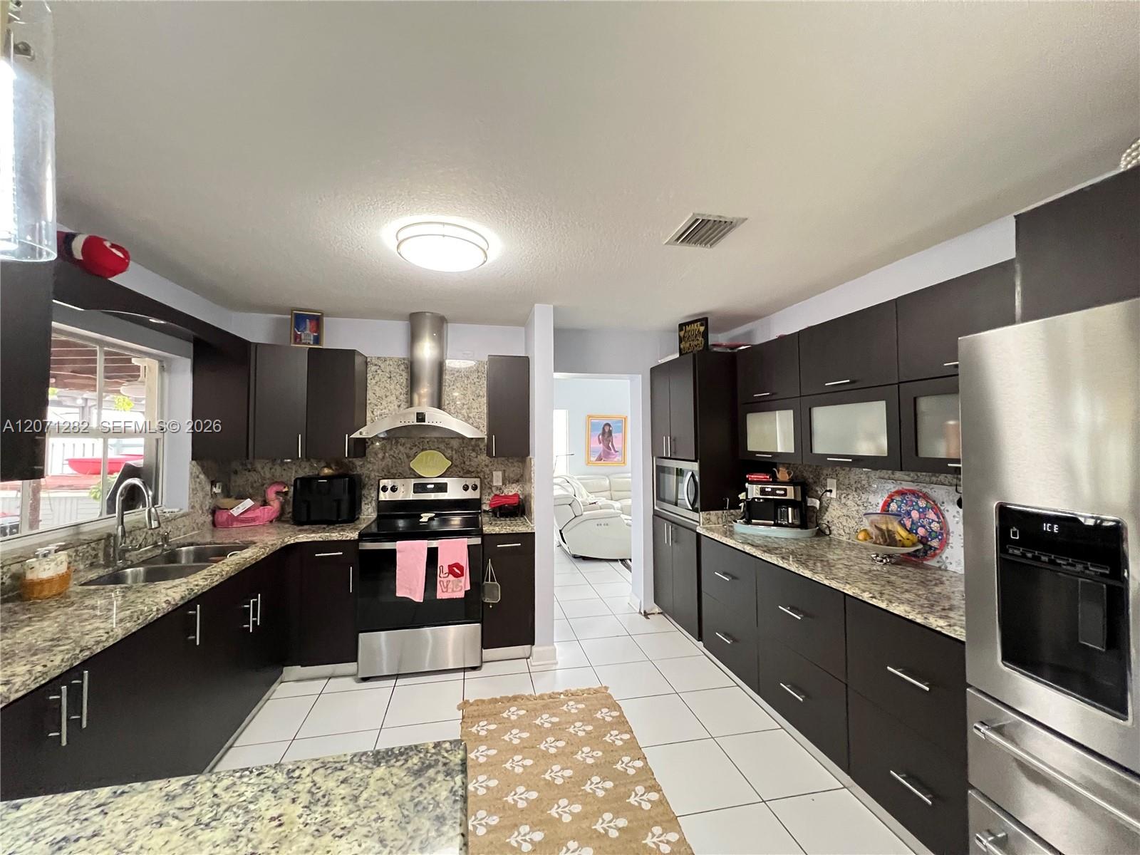13249 NW 9 LN, Miami FL 33182