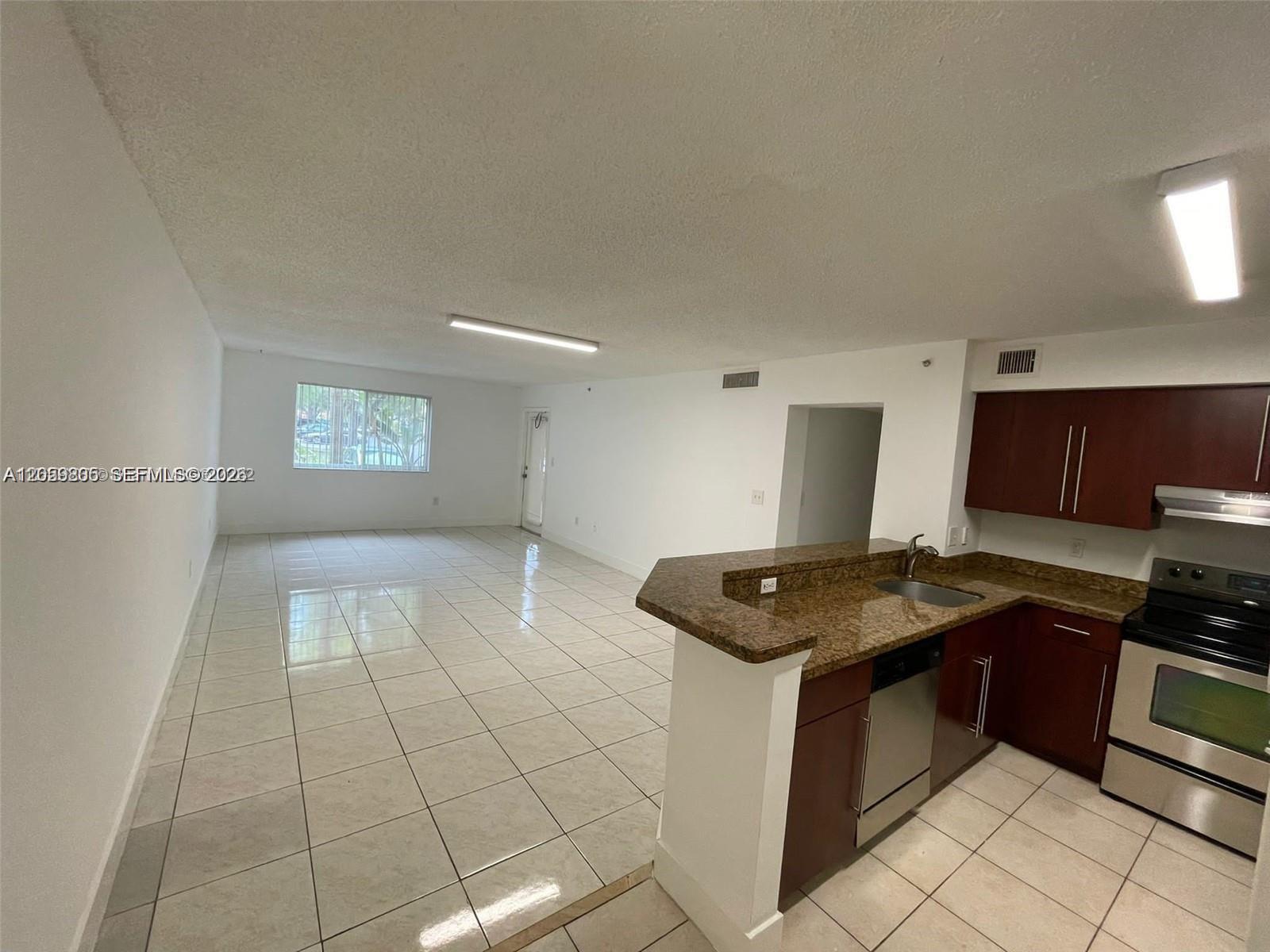 761 N Pine Island Rd # 104 — Photo 3