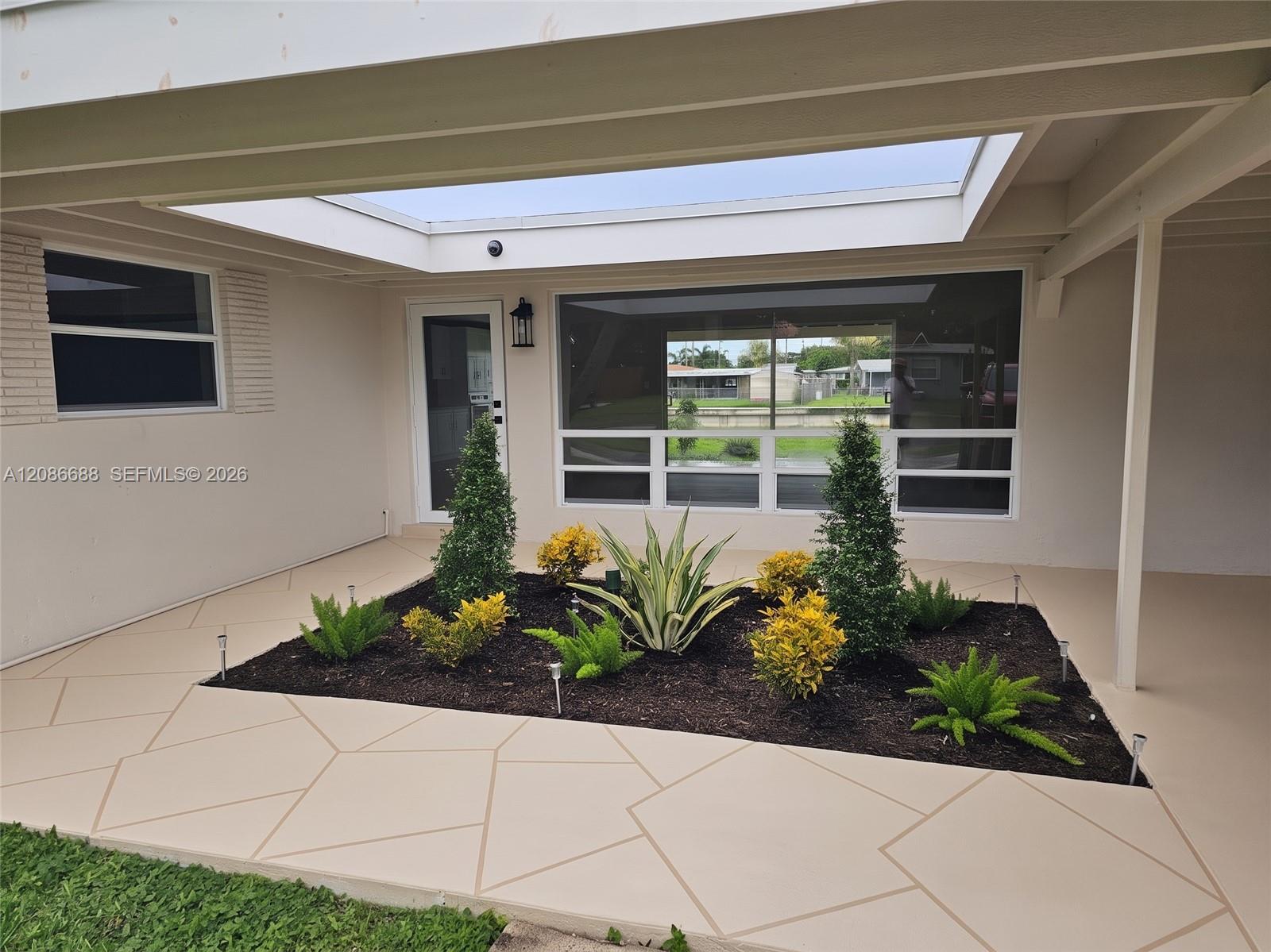 6064 NW 16th Ct — Photo 2