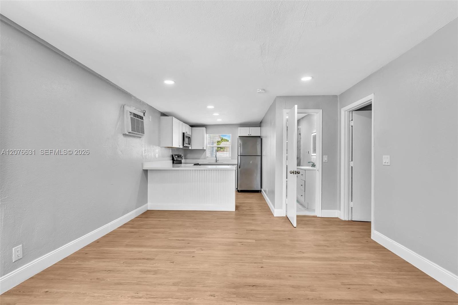 163 NW 40th St — Photo 3