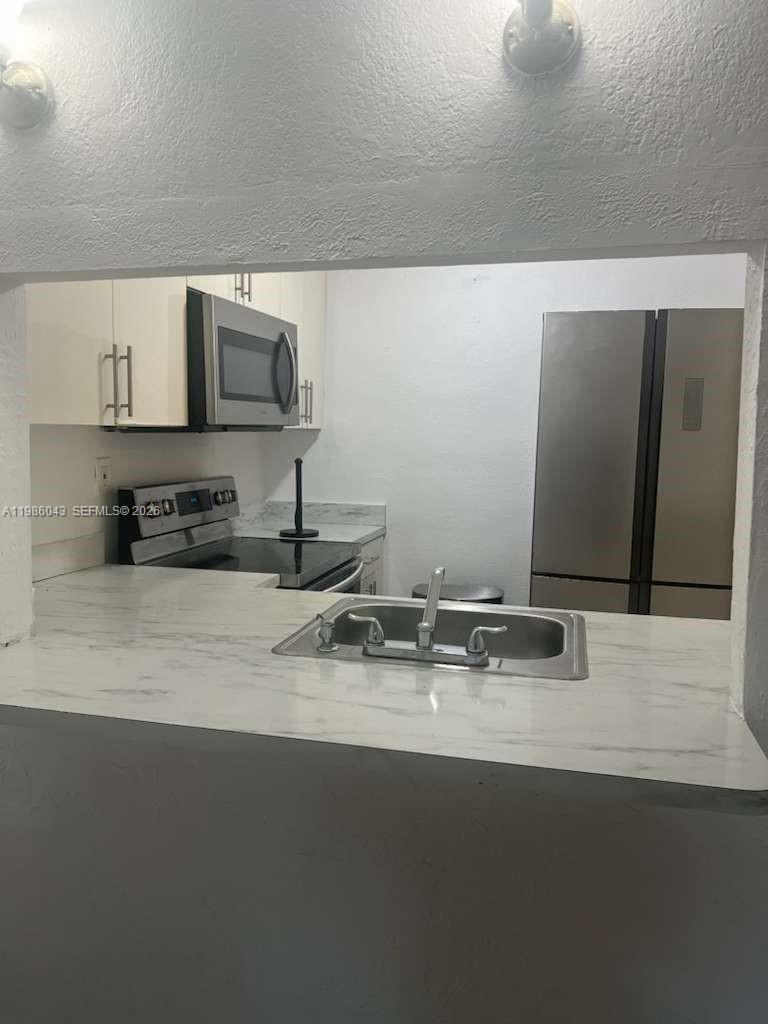 4550 NW 9th St # 114E, Miami FL 33126