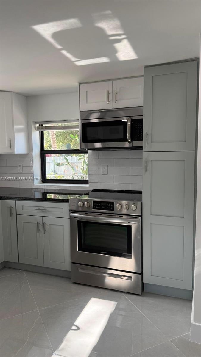 305 NE 58th Ter # 0 — Photo 3