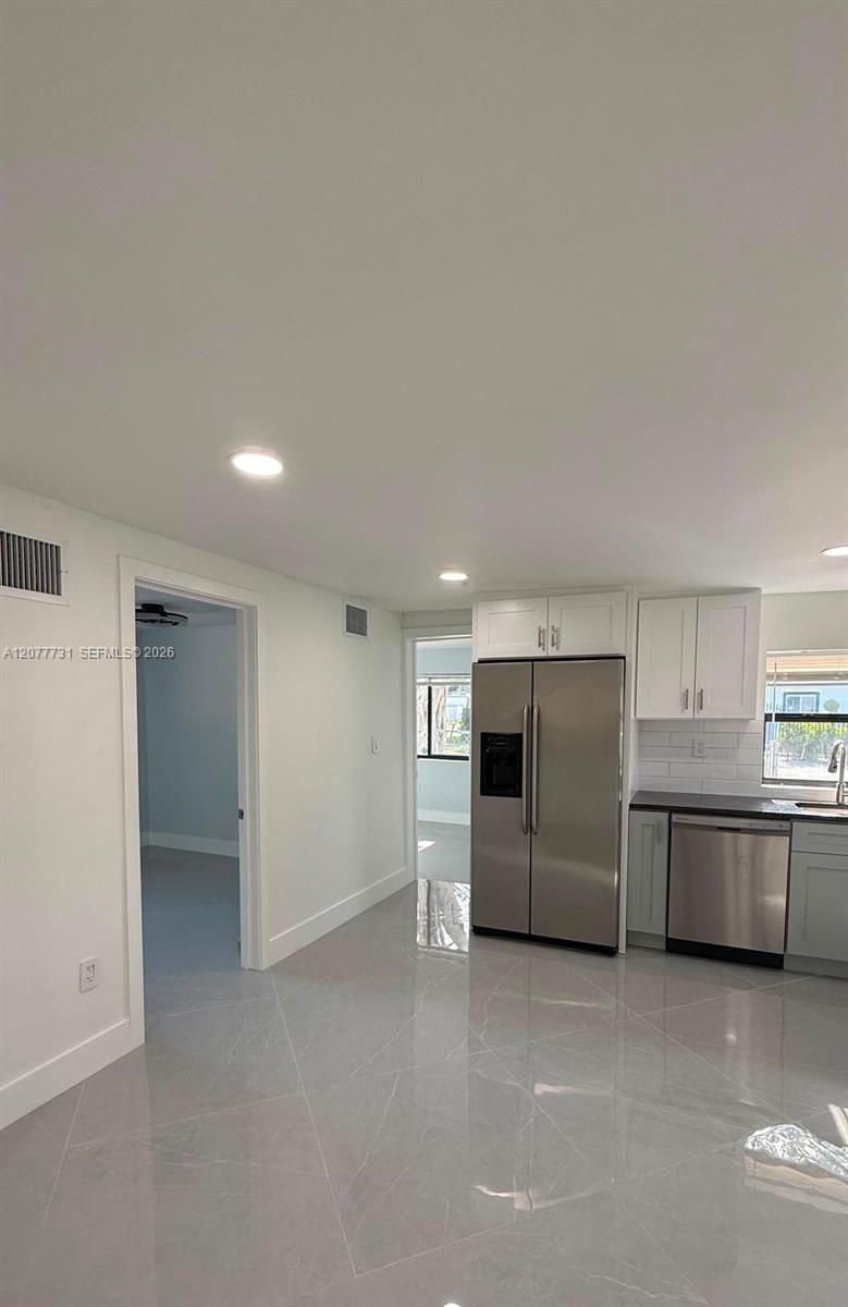 305 NE 58th Ter # 0 — Photo 5