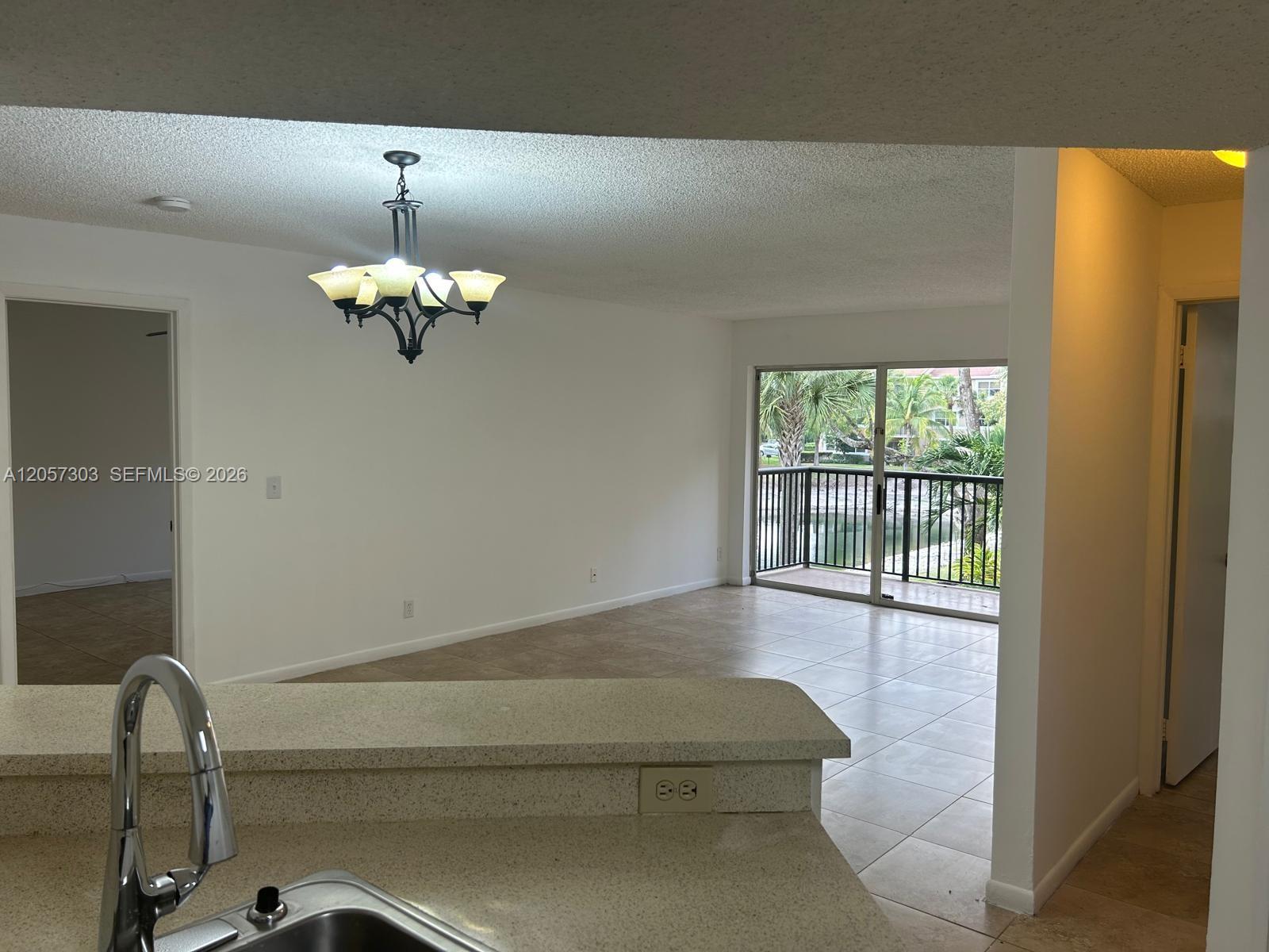 8851 Wiles Rd # 208 — Photo 3