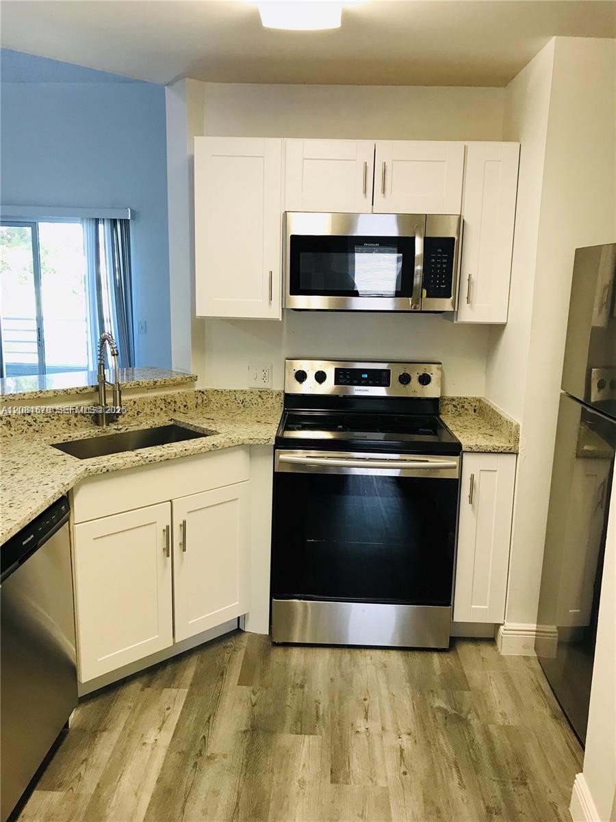 3437 NW 44th St # 204 — Photo 4