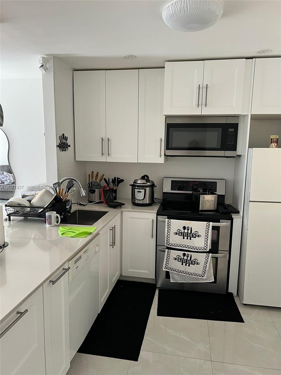 7810 Camino Real # 306 — Photo 3