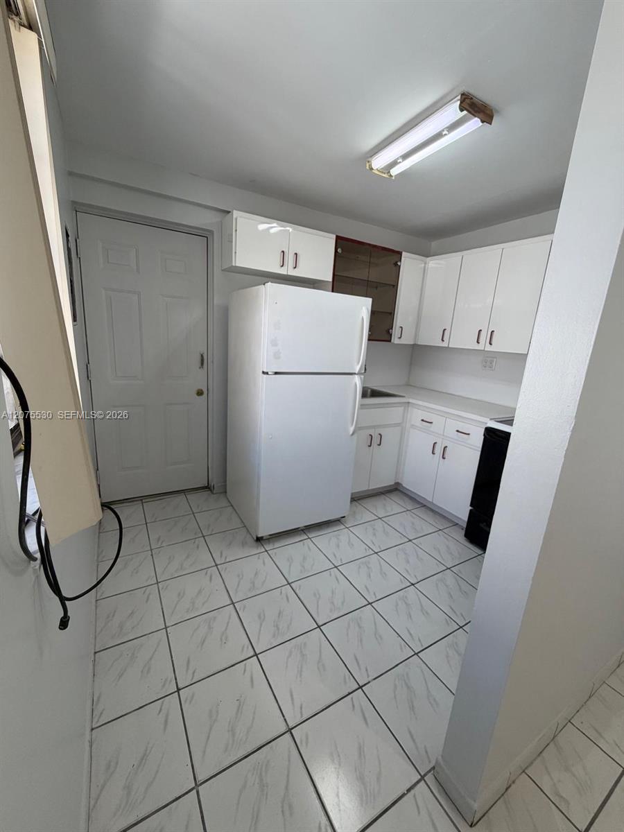 1261 W 60th Ter # 1261 — Photo 4
