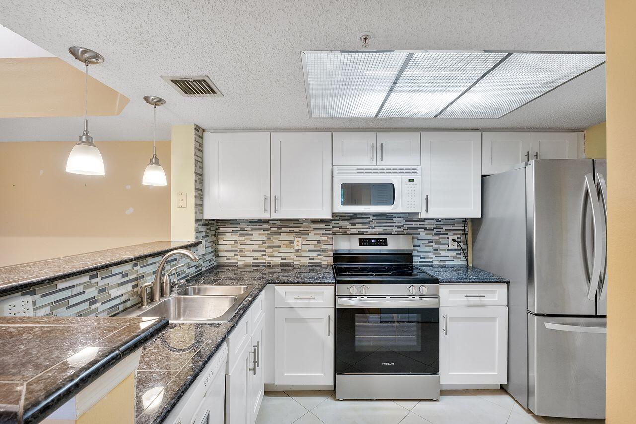 5011 Wiles Road # 303, Coconut Creek FL 33073