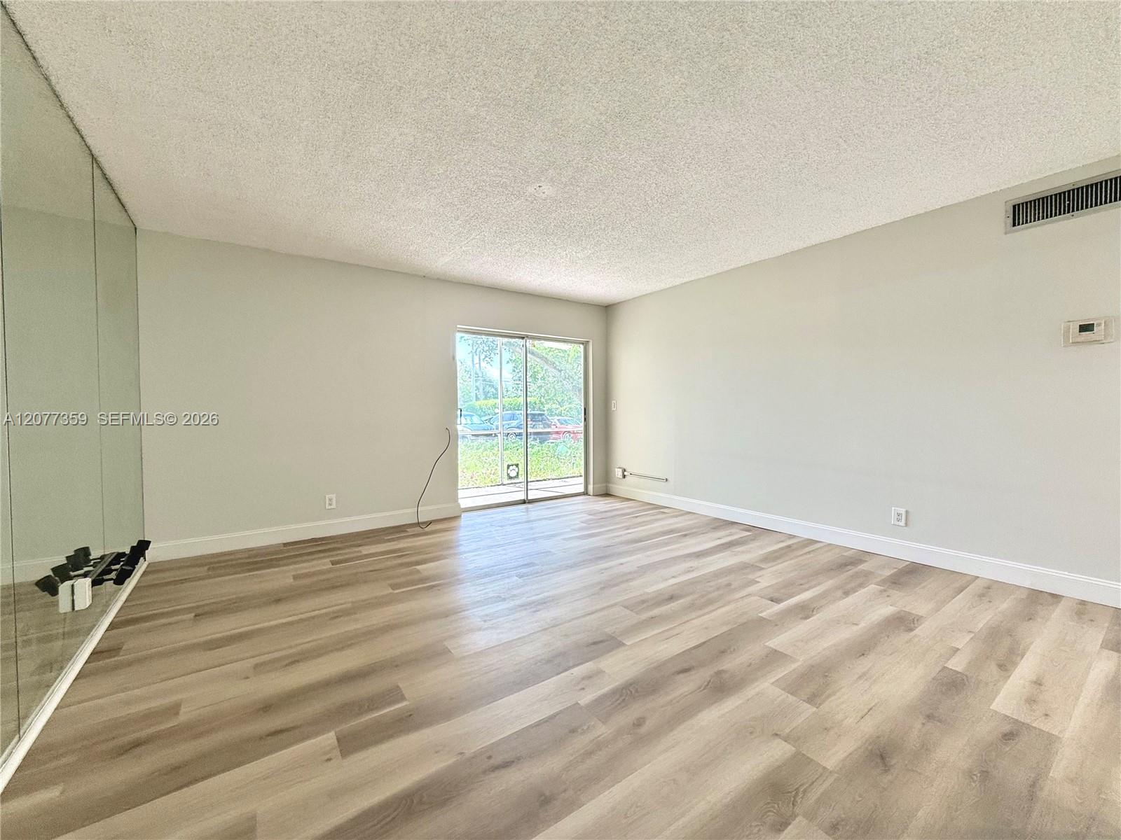 Living and dining area new floor fresh paint