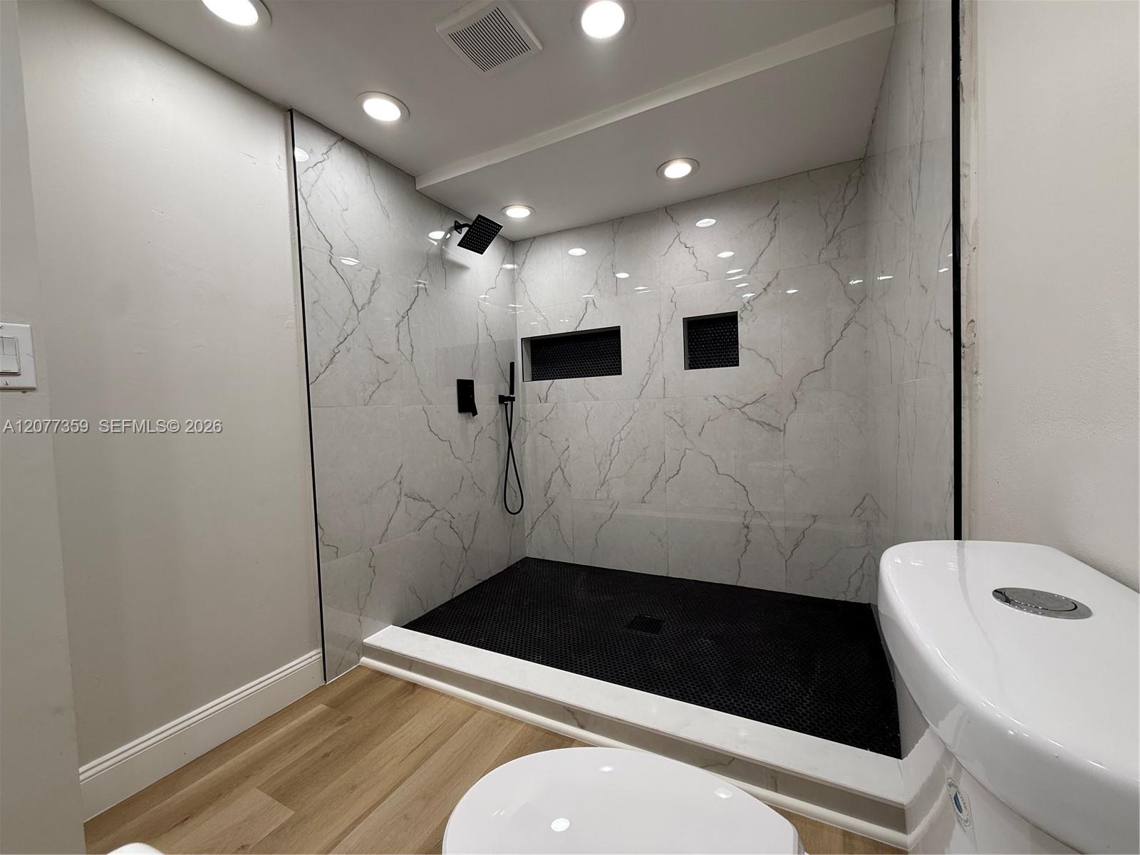 Updated bathroom with new floors