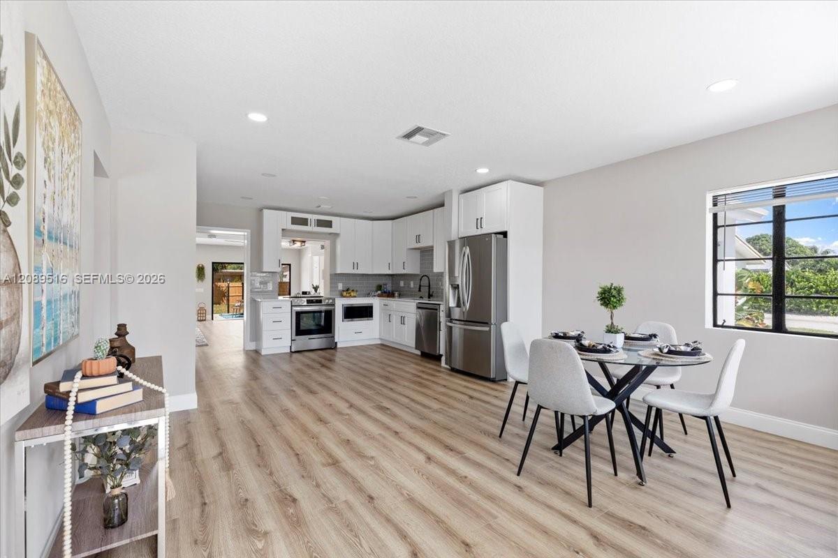 1227 N Ocean Breeze — Photo 2