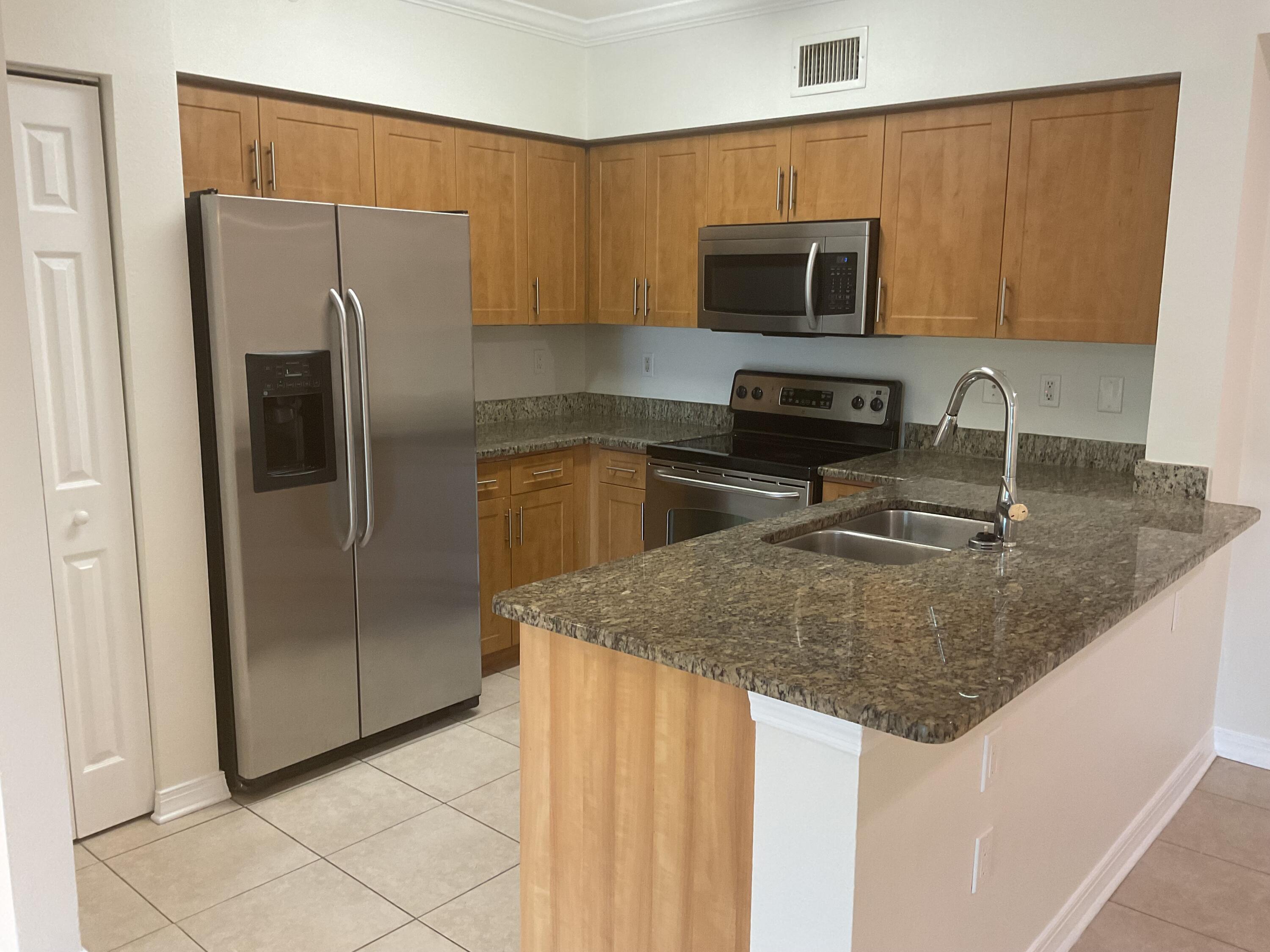 6505 Emerald Dunes Drive # 204, West Palm Beach FL 33411