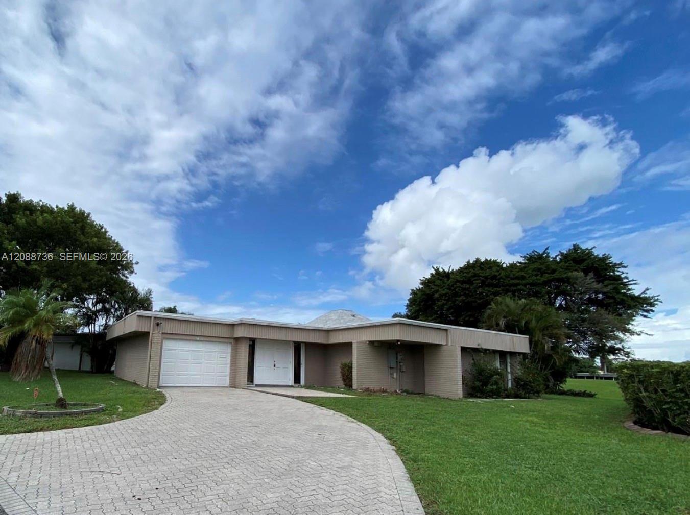 6105 Royal Poinciana Ln, Tamarac FL 33319