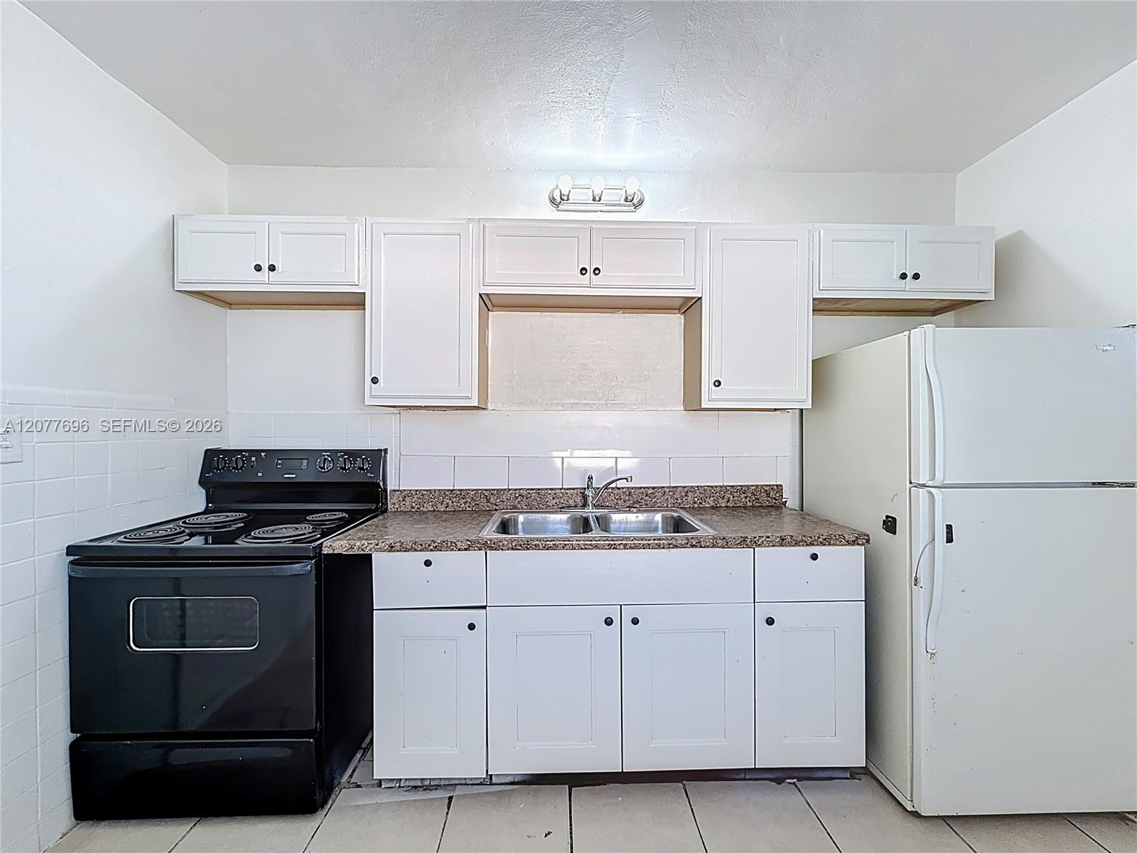 2419 NW 6th Ct — Photo 2